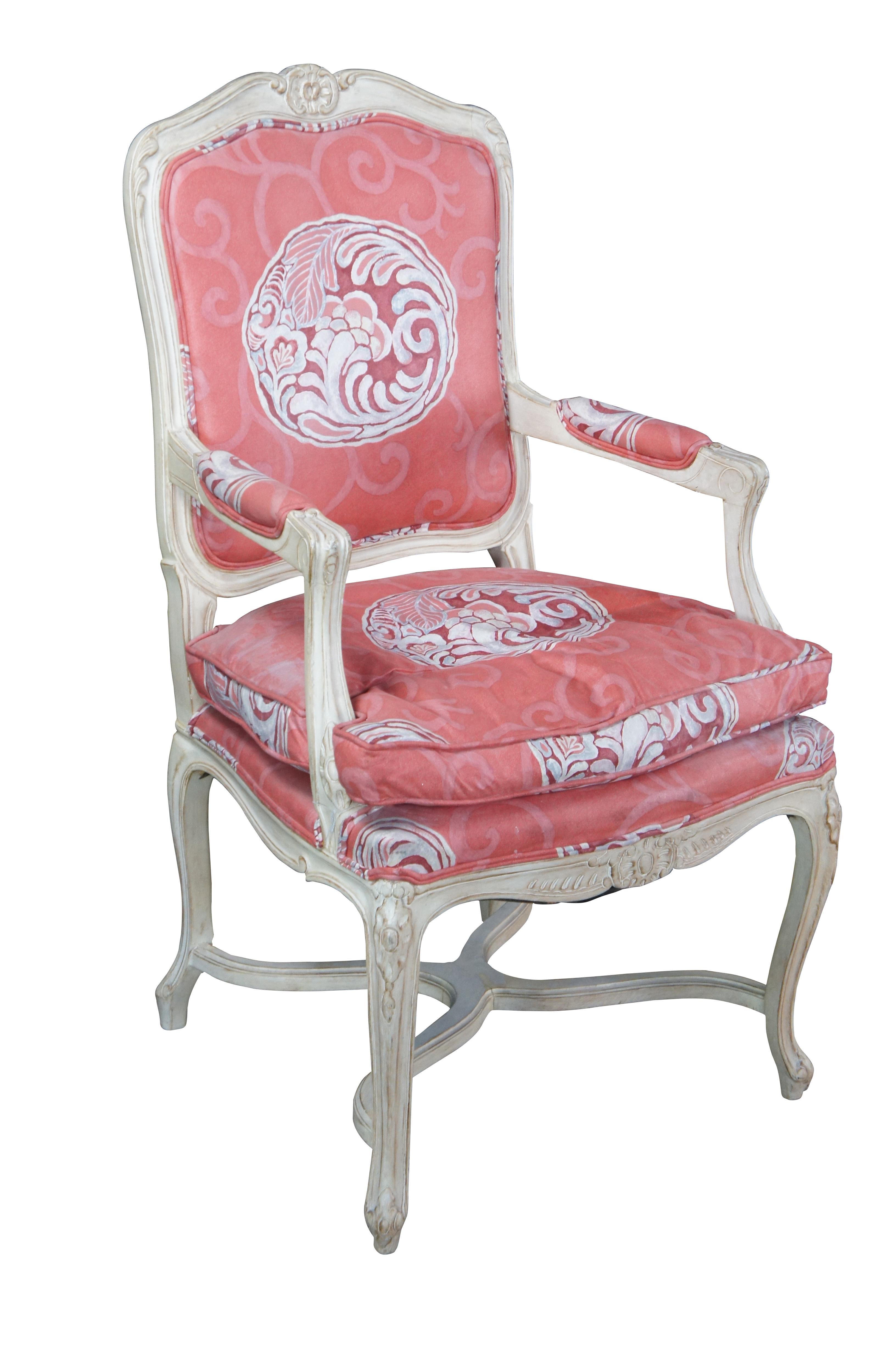Vintage Meyer Gunther Martini French Provincial Arm Chair, circa 1970s.  Features a hardwood frame with floral medallions and chinoiserie fabric.  The chair is supported by cabriole legs connected by an x-form stretcher.  Seat cushion is fixed. 