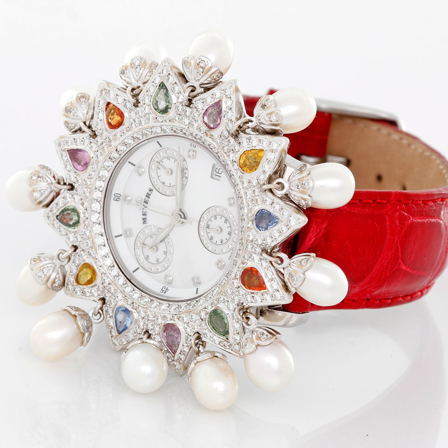 Meyers Lady  Diamond Chronograph Ladies Watch  - Quartz . Stainless steel with pearl fringe and diamond and colored sapphire briolettes set around bezel ( 51 mm ) . Mother of pearl pave set diamond dial with three subdials and date . Original Meyers