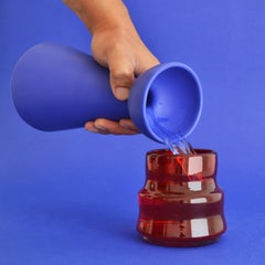 Mezcal and Tequila Bottle and two cups. Ceramic Blue and white Tequila bottle.