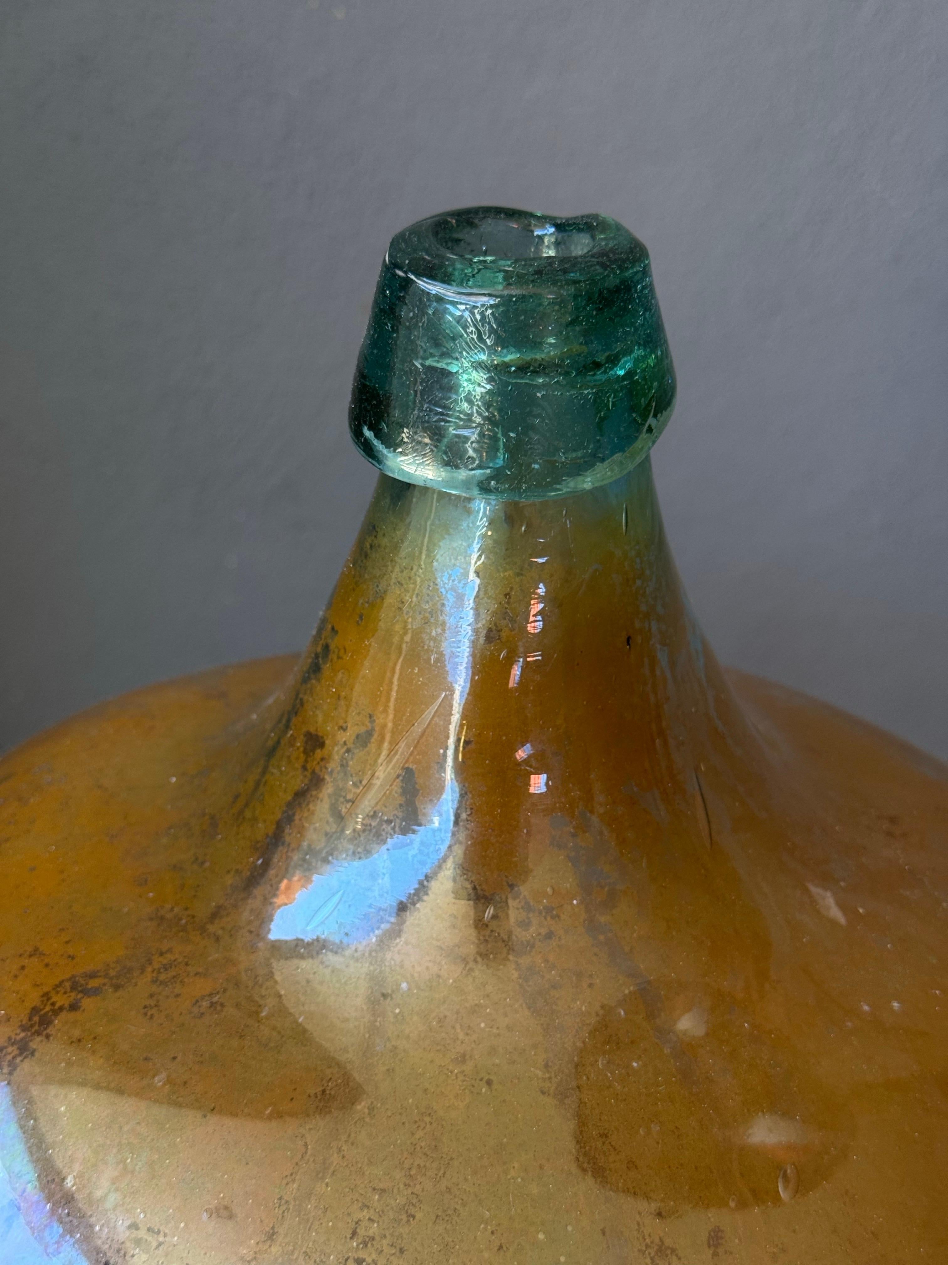 Damigiana di mezcal di colore arancione proveniente dal sud di Oaxaca, circa 1930. 