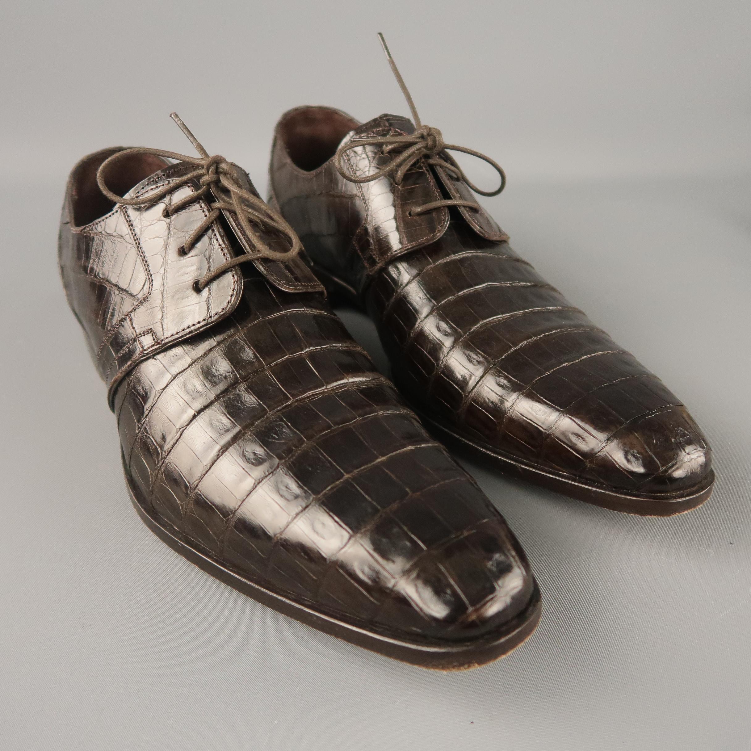 MEZLAN lace up shoes come in a brown alligator material featuring a wooden sole. Made in Spain.
 
Excellent Pre-Owned Condition.
Original retail price: $1,295.00
Marked: 9 M
 
Measurements:
 
Length: 12.5 in.
Width: 4.3 in.