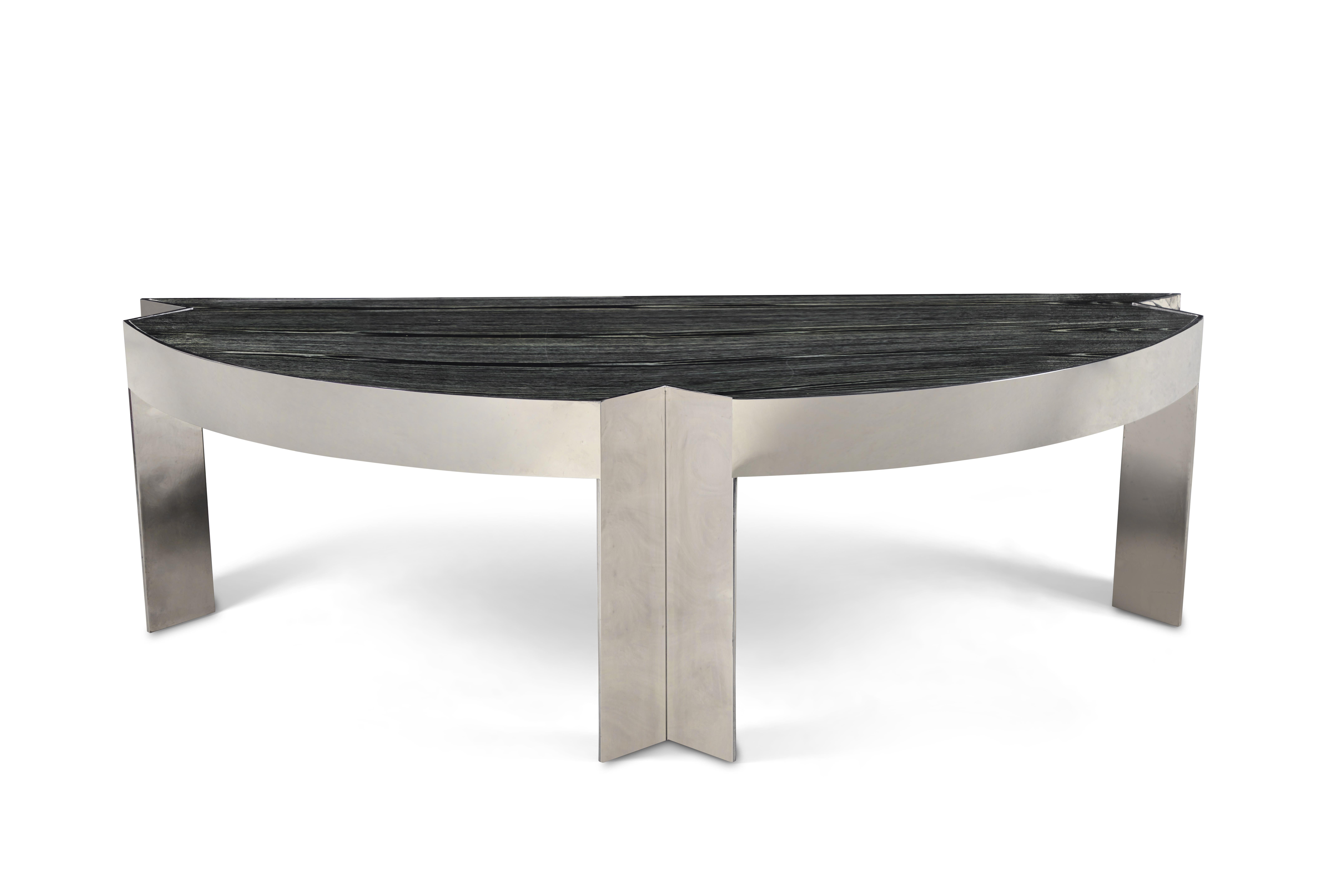 Monumentally scaled desk of polished stainless steel and charcoal gray zebra wood by Leon Rosen for Pace, 1980's. This is the ultimate executive desk and a true statement piece.