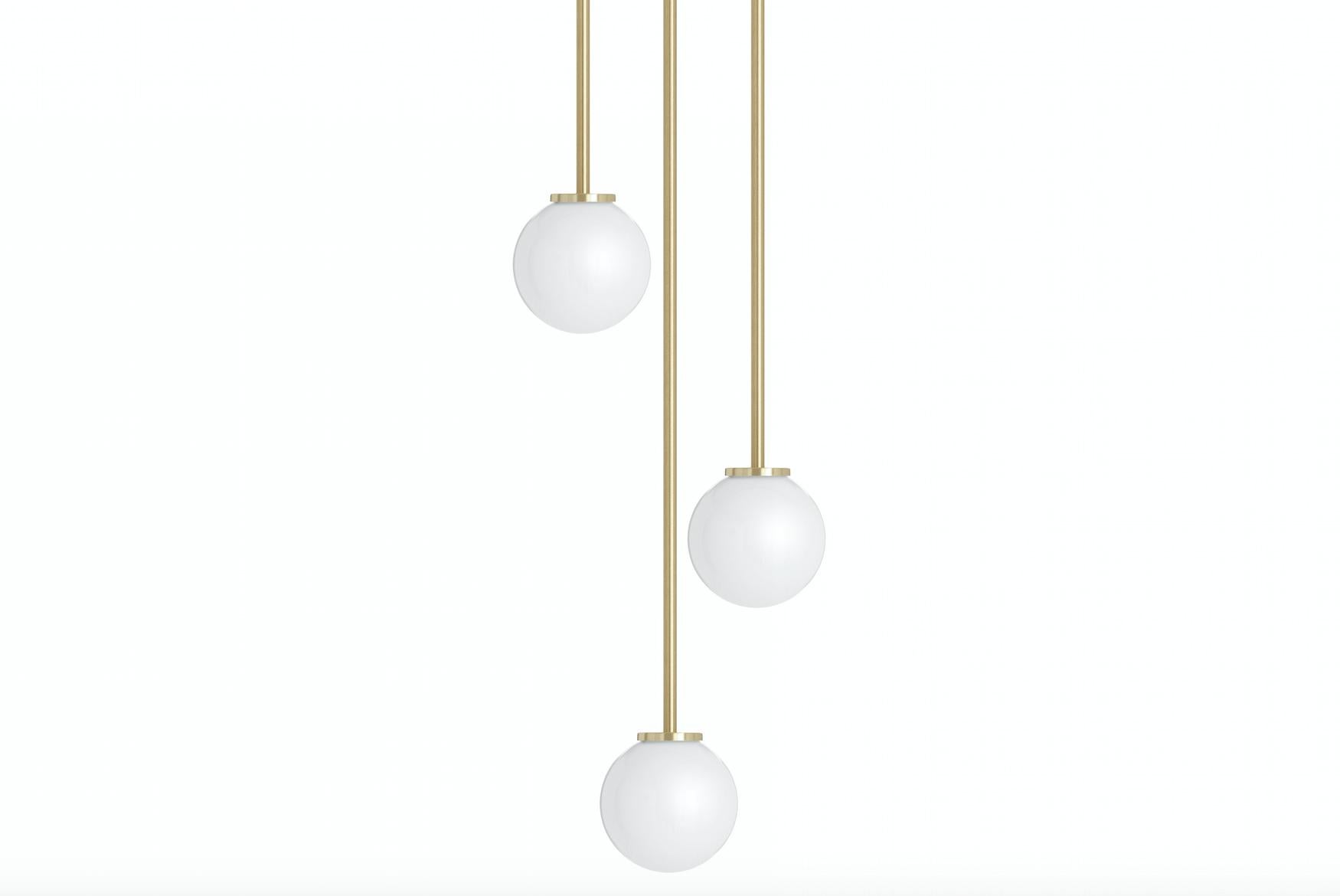 Mezzo cluster round by CTO Lighting
Materials: satin brass with opal glass shade 
Dimensions: H 15 x W 12 cm (pendant), overall to be specified

All our lamps can be wired according to each country. If sold to the USA it will be wired for the