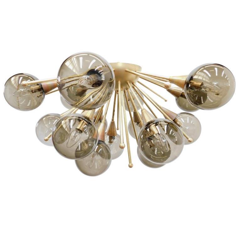 Italian sputnik flush mount with Murano glass globes mounted on solid brass frame
Designed by Fabio Bergomi / Made in Italy
15 lights / E12 or E14 type / max 40W each
Diameter: 35.5 inches / Height: 18 inches
Order Only / This item ships from