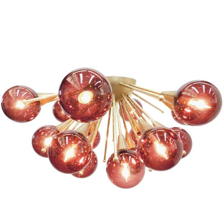 Italian sputnik flush mount with Murano glass globes mounted on solid brass frame
Designed by Fabio Bergomi / Made in Italy
15 lights / E12 or E14 type / max 40W each
Diameter: 35.5 inches / Height: 18 inches
Order Only / This item ships from