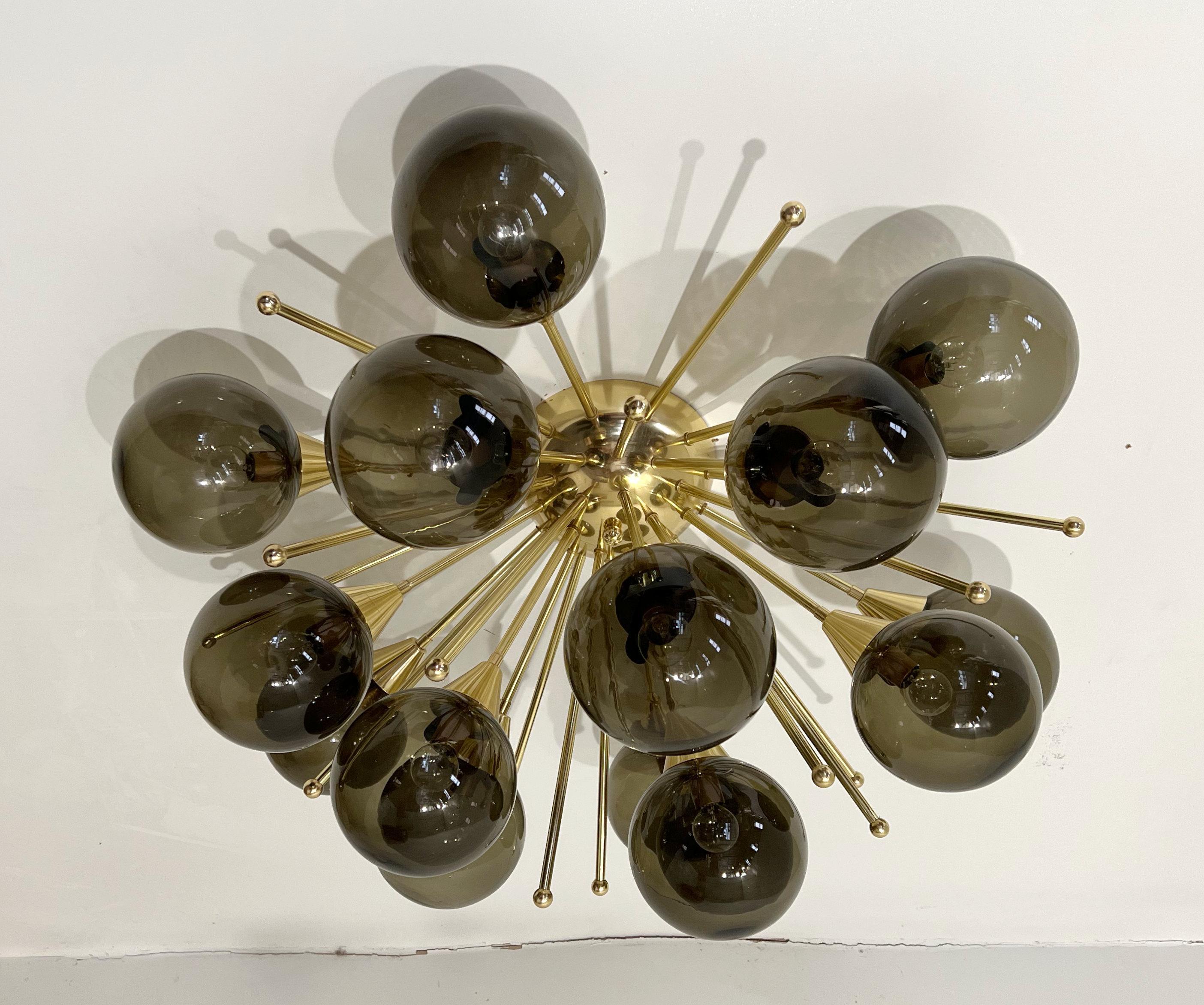 Italian sputnik flush mount with Murano glass globes mounted on solid brass frame
Designed by Fabio Bergomi / Made in Italy
15 lights / E12 or E14 type / max 40W each
Diameter: 35.5 inches / Height: 18 inches
Order Only / This item ships from