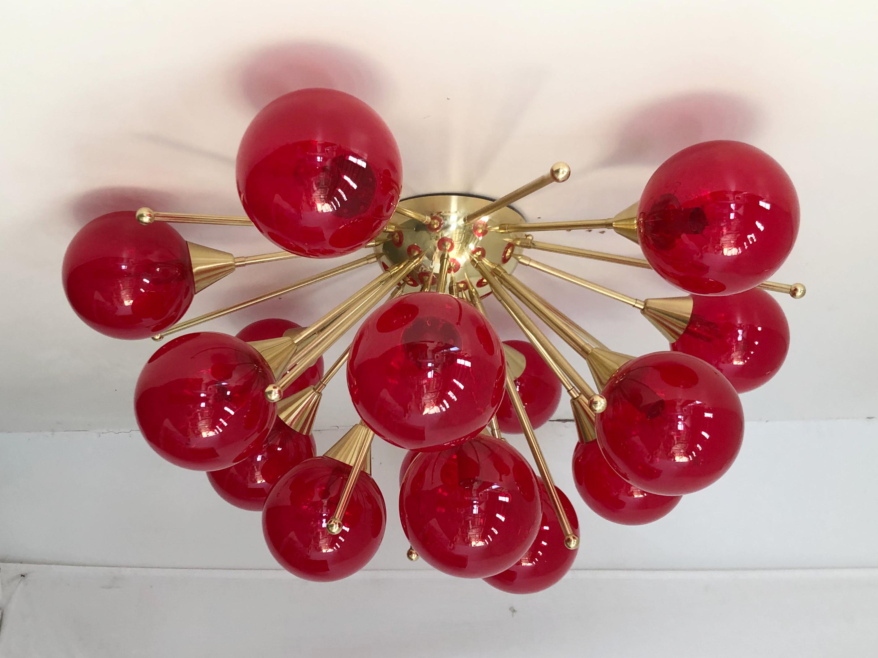 Italian Sputnik flush mount with Murano glass globes mounted on solid brass frame / Designed by Fabio Bergomi for Fabio Ltd / Made in Italy
15 lights / E12 or E14 type / max 40W each
Measures: Diameter 35.5 inches, height 18 inches
Order only / this