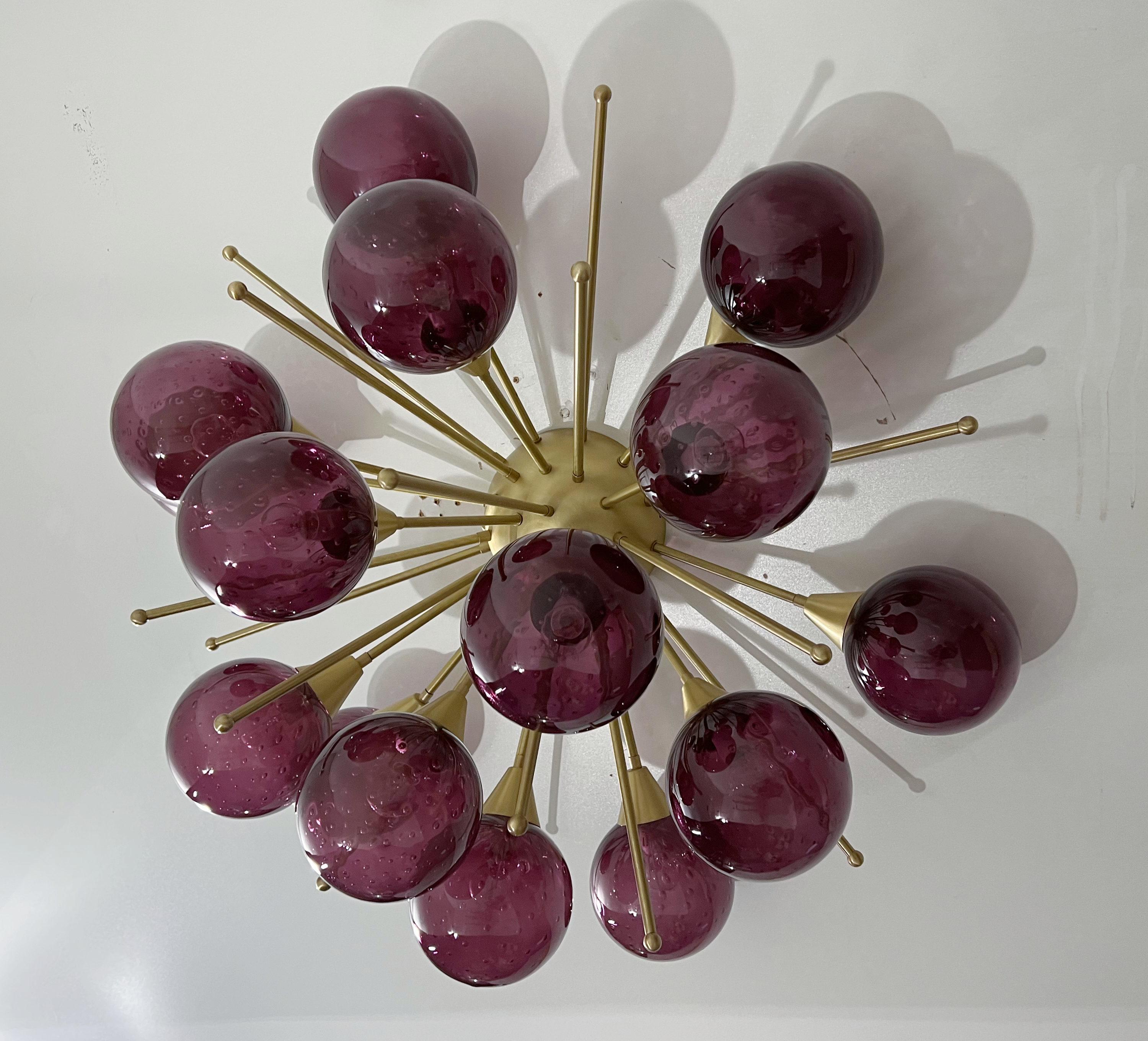 Italian Sputnik flush mount with Murano glass globes mounted on solid brass frame / Designed by Fabio Bergomi for Fabio Ltd / Made in Italy
15 lights / E12 or E14 type / max 40W each
Measures: Diameter 35.5 inches, height 18 inches
Order only / this