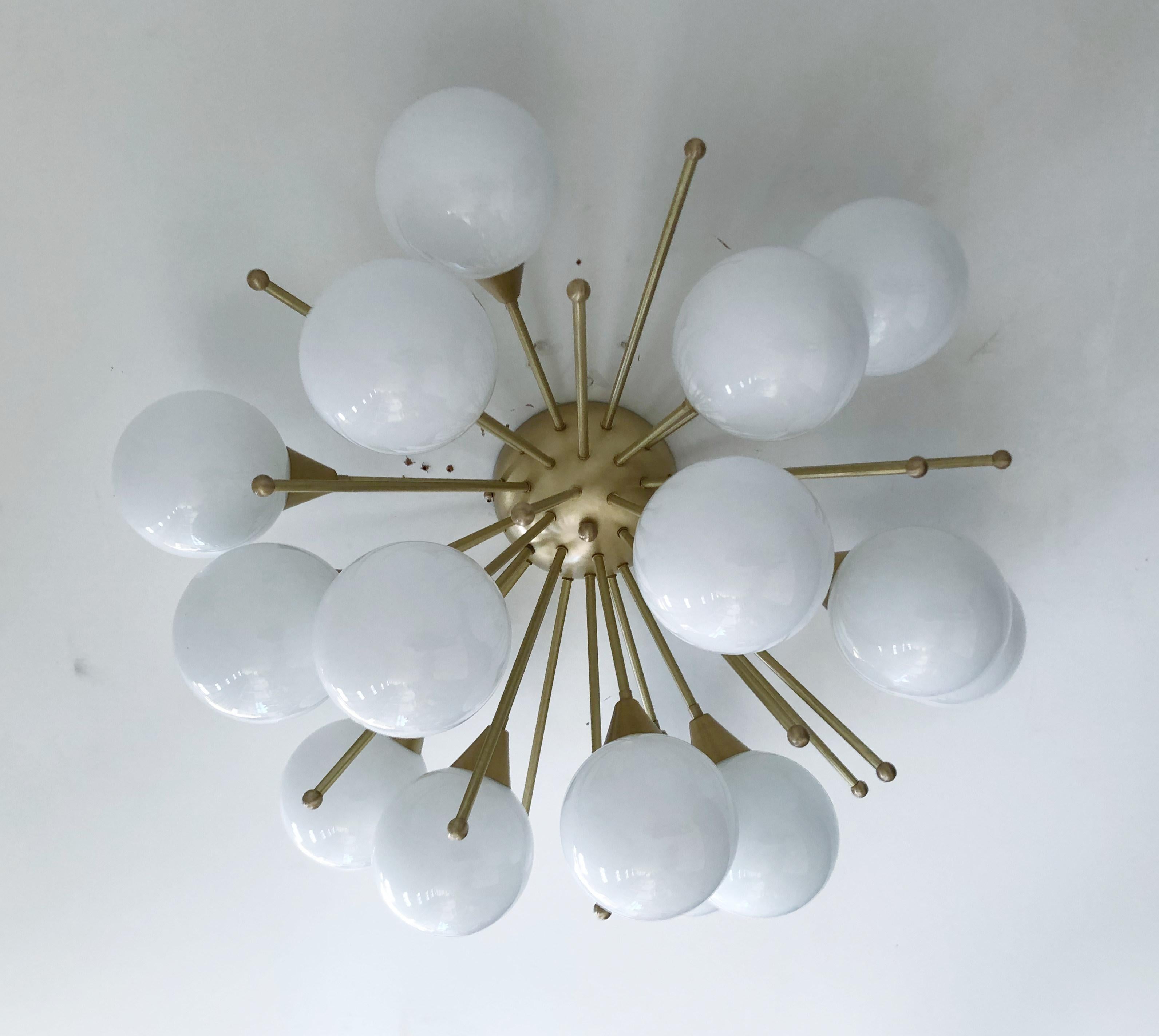 Italian Sputnik flush mount with Murano glass globes mounted on solid brass frame / Designed by Fabio Bergomi for Fabio Ltd / Made in Italy
15 lights / E12 or E14 type / max 40W each
Measures: Diameter 35.5 inches, height 18 inches
Order only / this