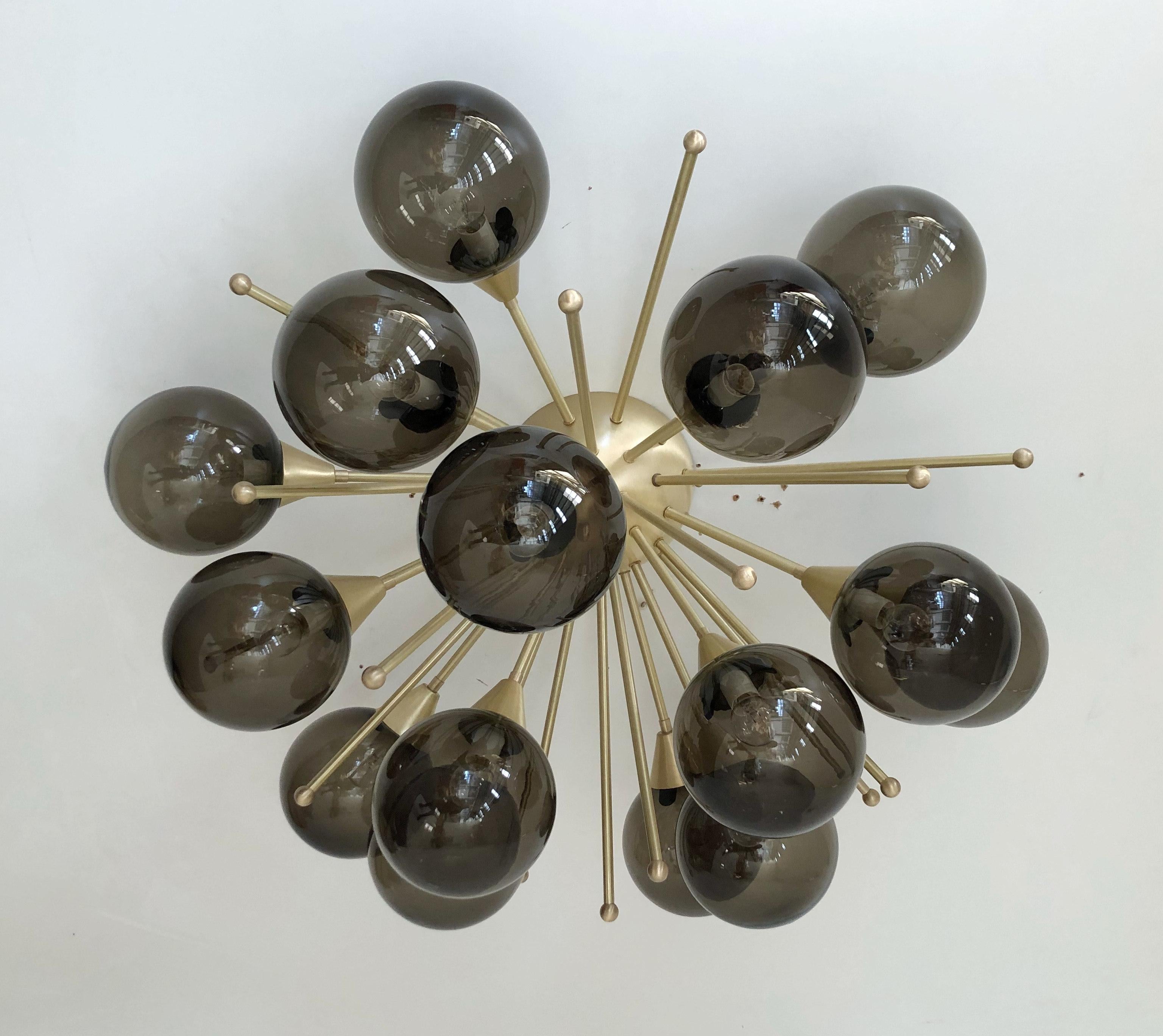 Italian sputnik flush mount with Murano glass globes mounted on solid brass frame
Designed by Fabio Bergomi / Made in Italy
15 lights / E12 or E14 type / max 40W each
Diameter: 35.5 inches / Height: 18 inches
Order Only / This item ships from