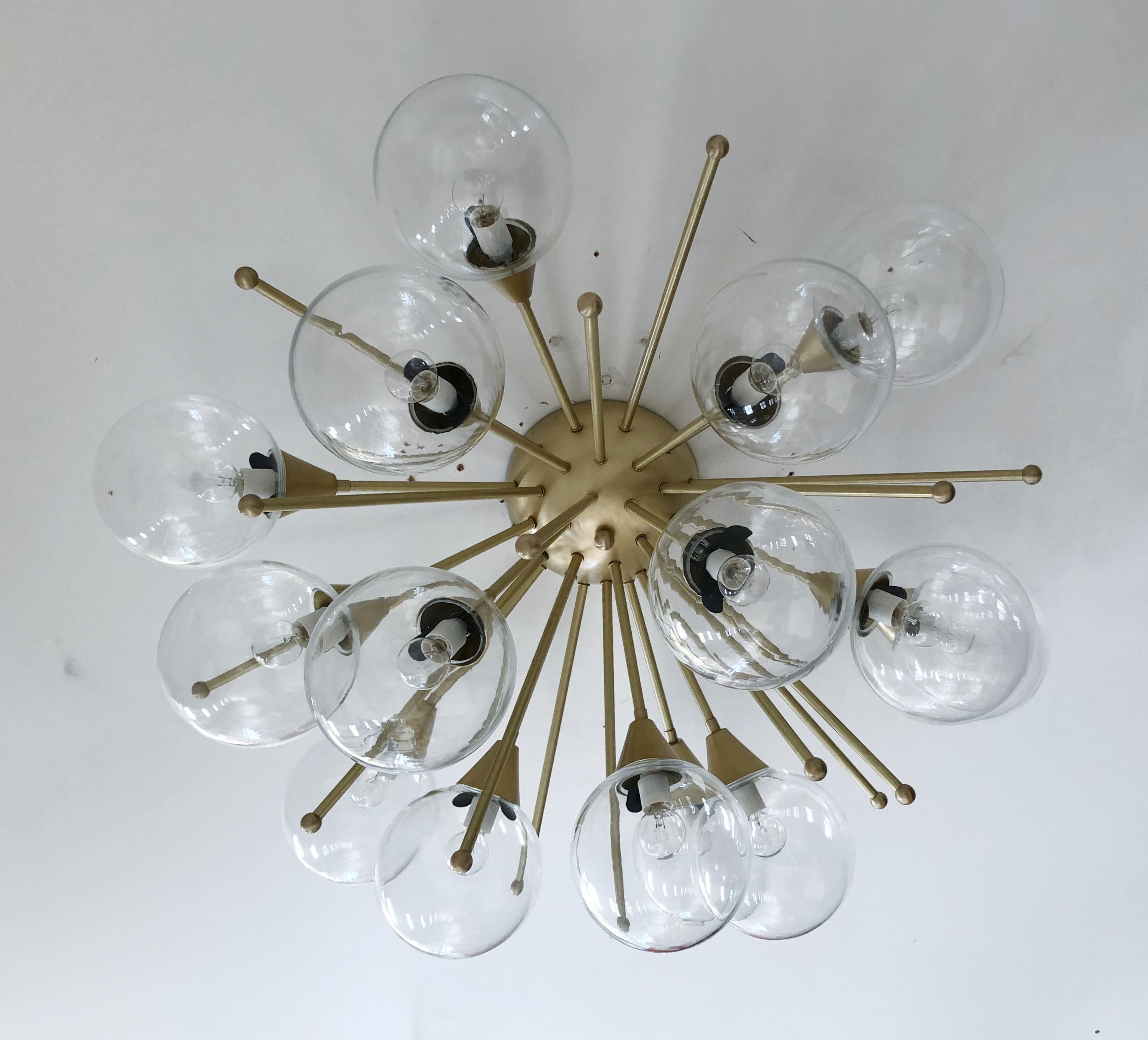 Italian sputnik flush mount with Murano glass globes mounted on solid brass frame
Designed by Fabio Bergomi / Made in Italy
15 lights / E12 or E14 type / max 40W each
Diameter: 35.5 inches / Height: 18 inches
Order Only / This item ships from