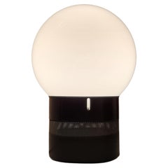 Mezzoracolo table lamp by Gae Aulenti for Artemide 1969