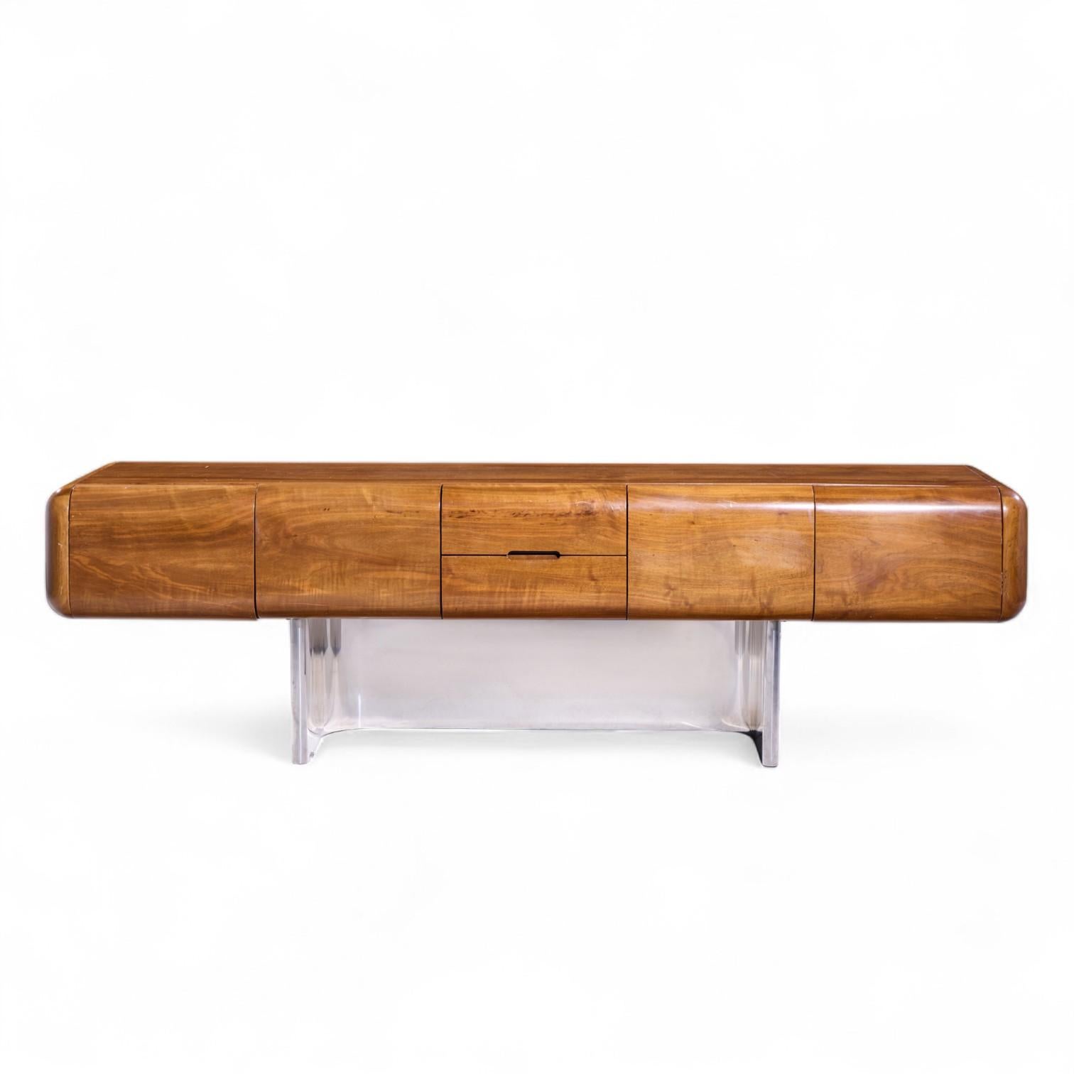 M.F. Harty for Stow Davis Tomorrow Mid Century Walnut and Chrome Floating Credenza

This credenza measures: 95.75 wide x 22 deep x 28.25 inches high

Good Vintage Condition - Credenza has Minor Scratches and Wear Throughout. Chrome Base is in Great