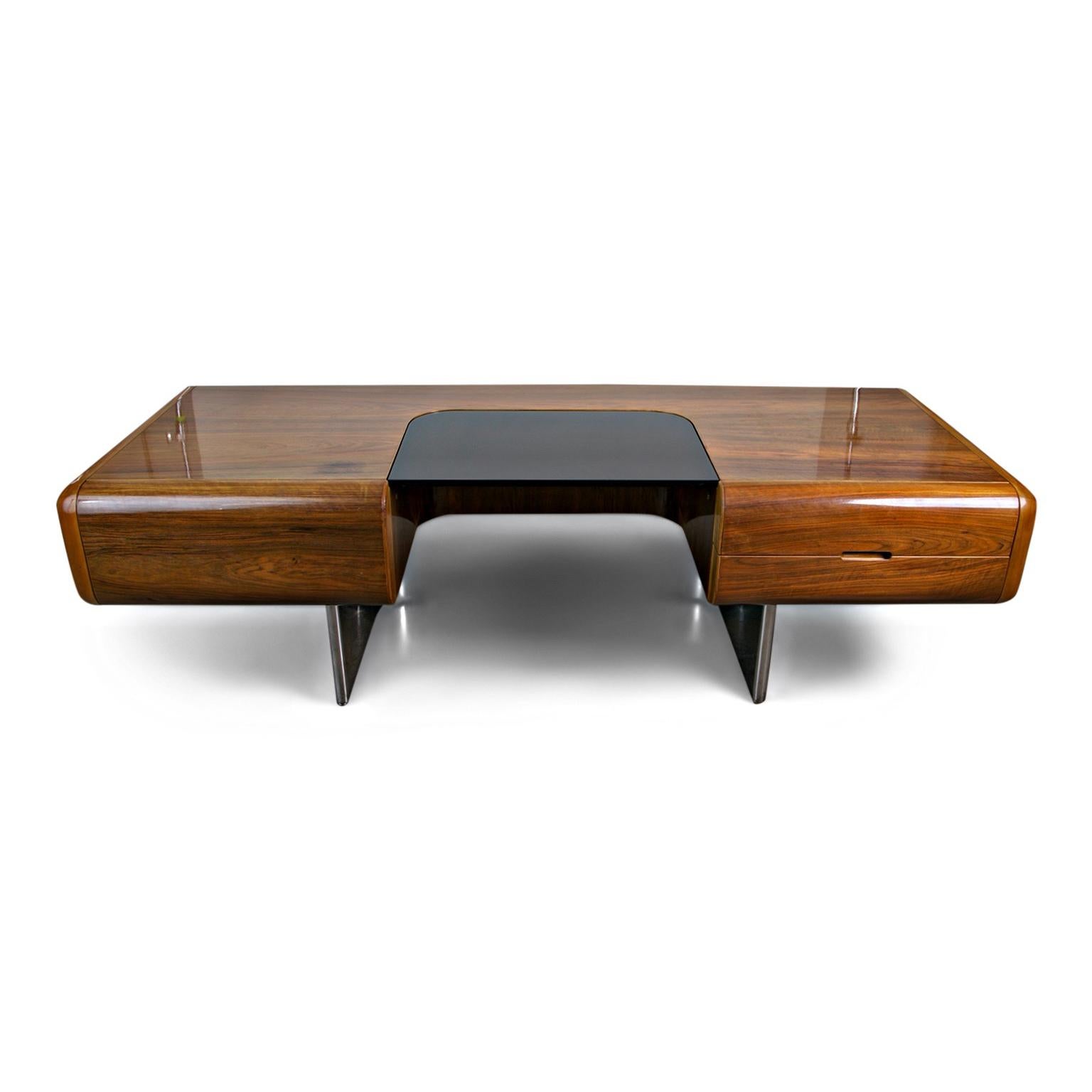 An incredibly rare, special and massive Executive Desk designed by M. F. Harty and produced by Stow Davis as part of the 