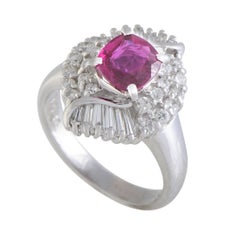 MFCO22 Estate Platinum Round/Tapered Baguette Diamonds and Ruby Oval Ring MFCO22 Estate Platinum Round/Tapered Baguette Diamonds and Ruby Oval Ring