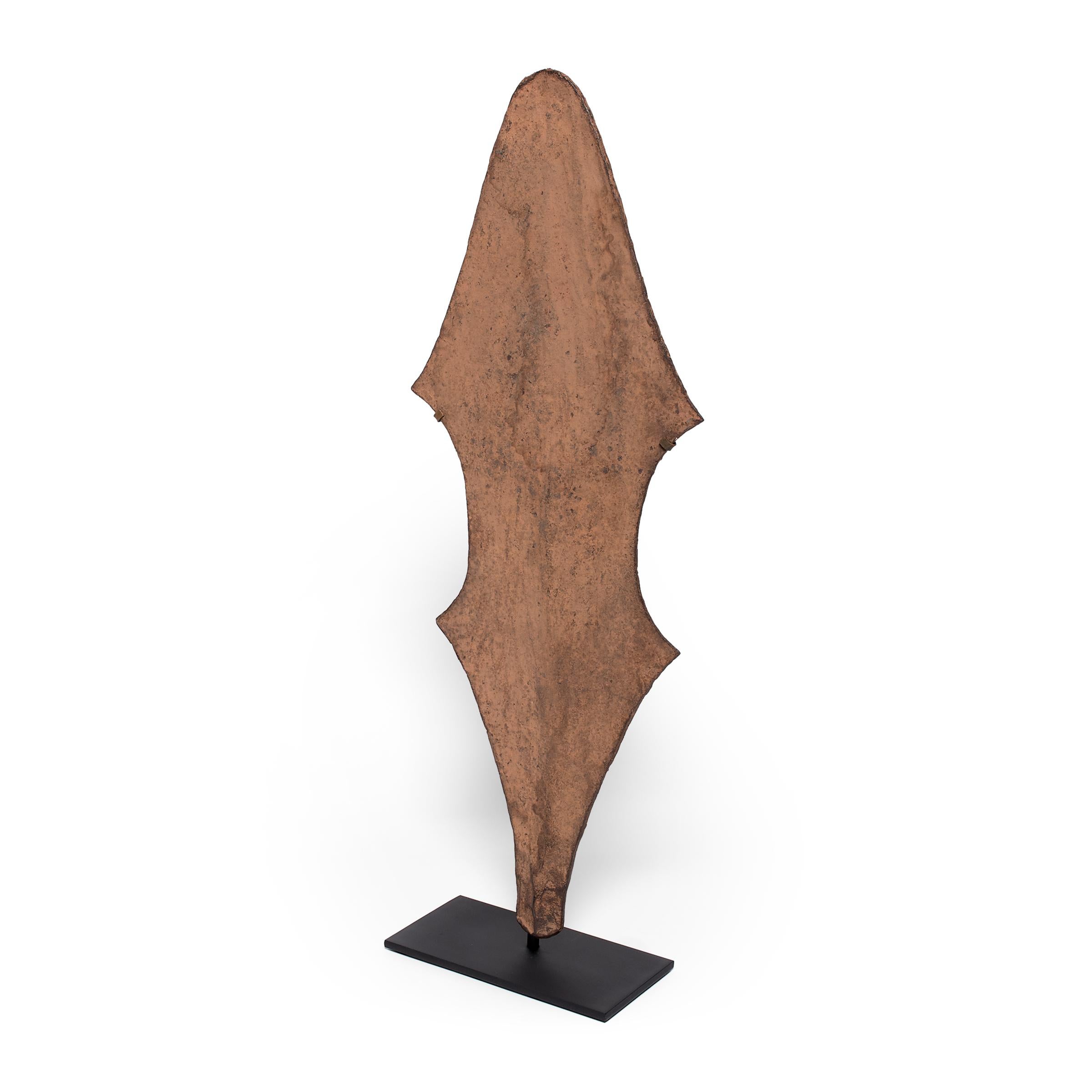 In many pre-colonial regions of Africa, iron was so valuable that tools often doubled as currencies for rare but significant transactions. This large iron form is a currency piece from the Mfunte peoples of what is now the Democratic Republic of the