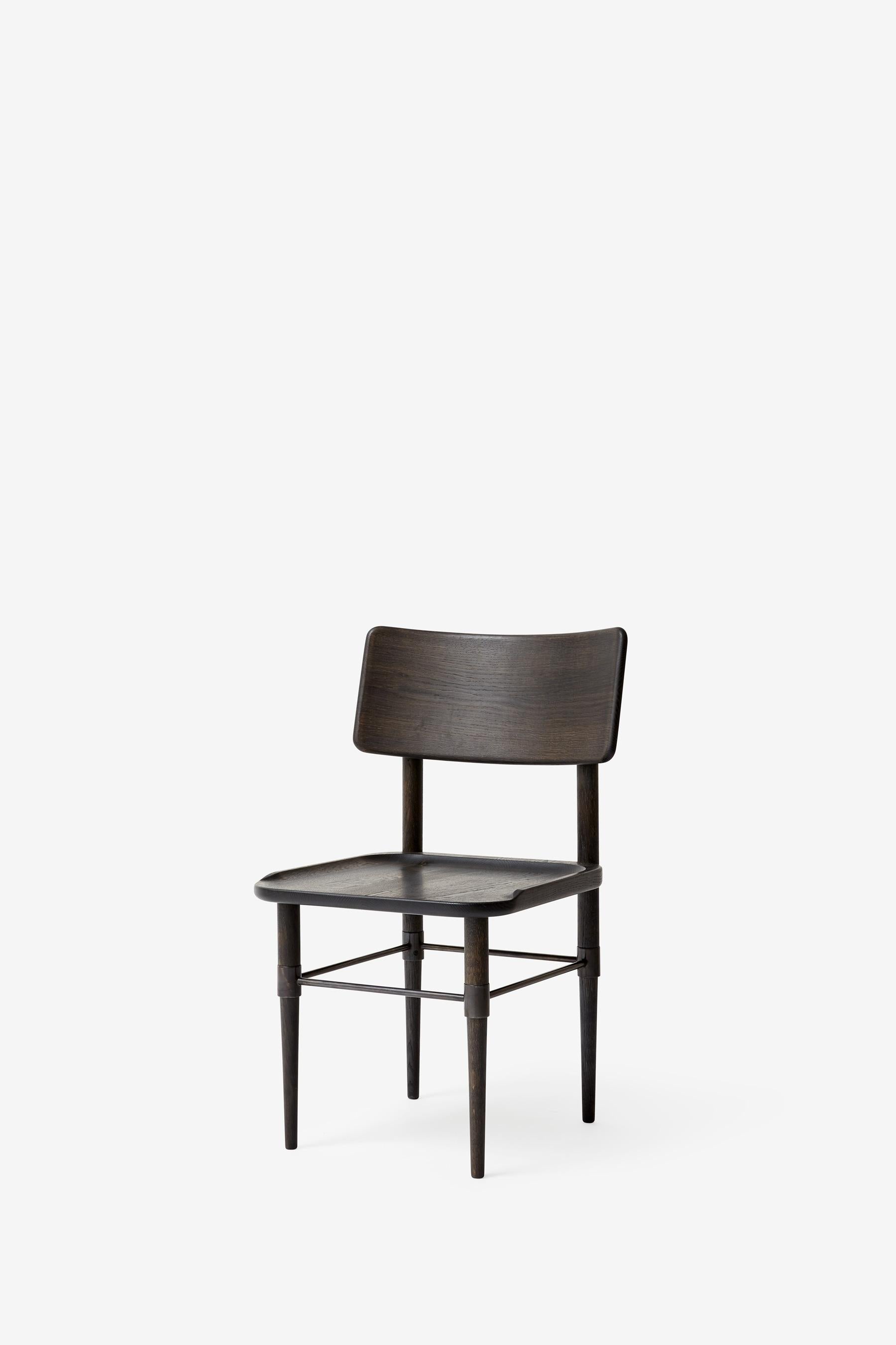 MG101 Dining chair in Dark Nature oak and blackened metal. The seat pad is not included and can be ordered separately.

The Holmen series originates in a series of furniture, which was developed for Michelin restaurant 108 in Copenhagen. The common