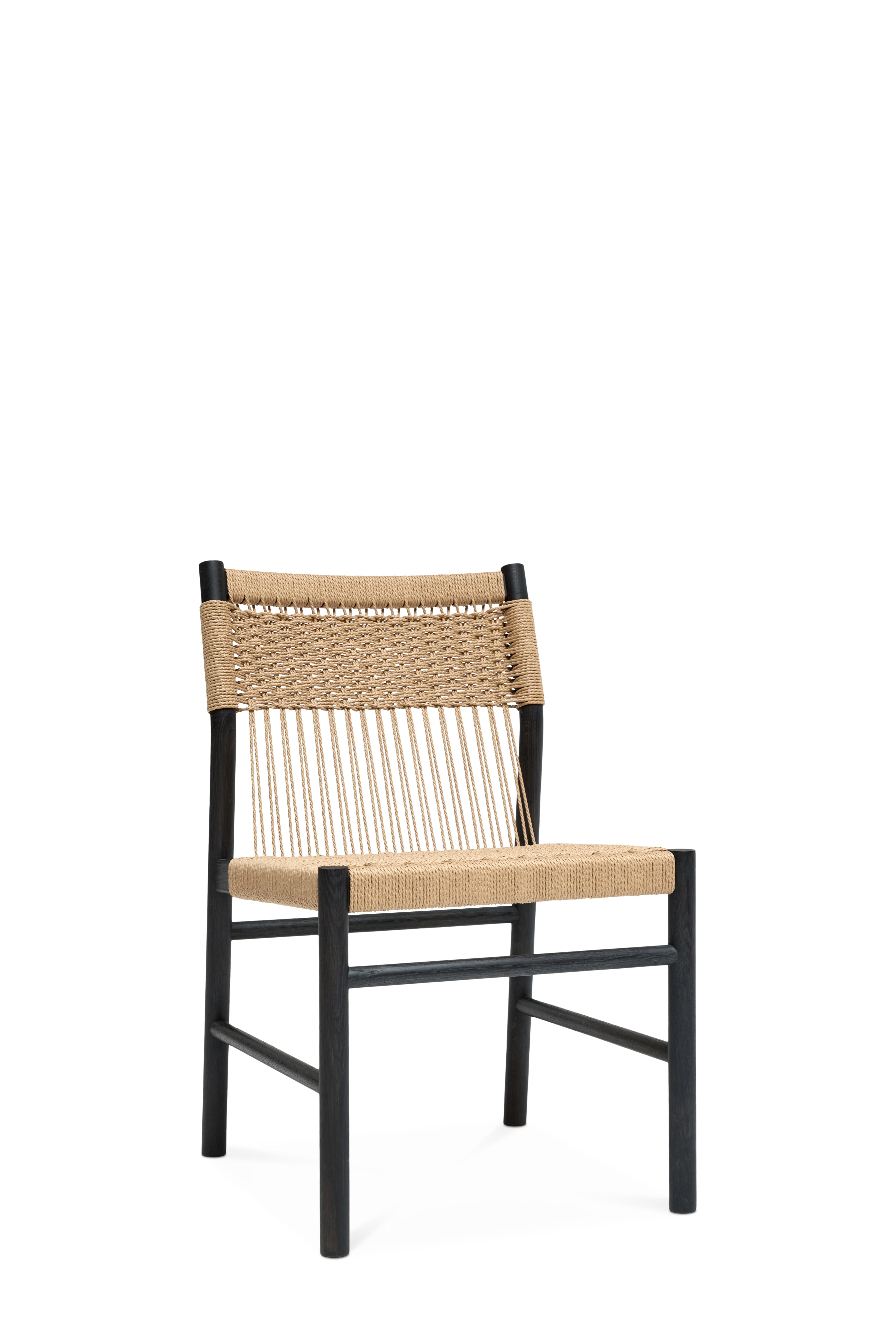 MG105 Dining Chair by Malte Gormsen
Dimensions: D 56.4 x W 50 x H 83 cm.
Materials: Dark Nature oak, natural paper cord.

Available in Nature, Raw Nature, Soap, Smoked, and Dark Nature.

Malte Gormsen Møbelsnedkeri is a cabinetmaker who combines