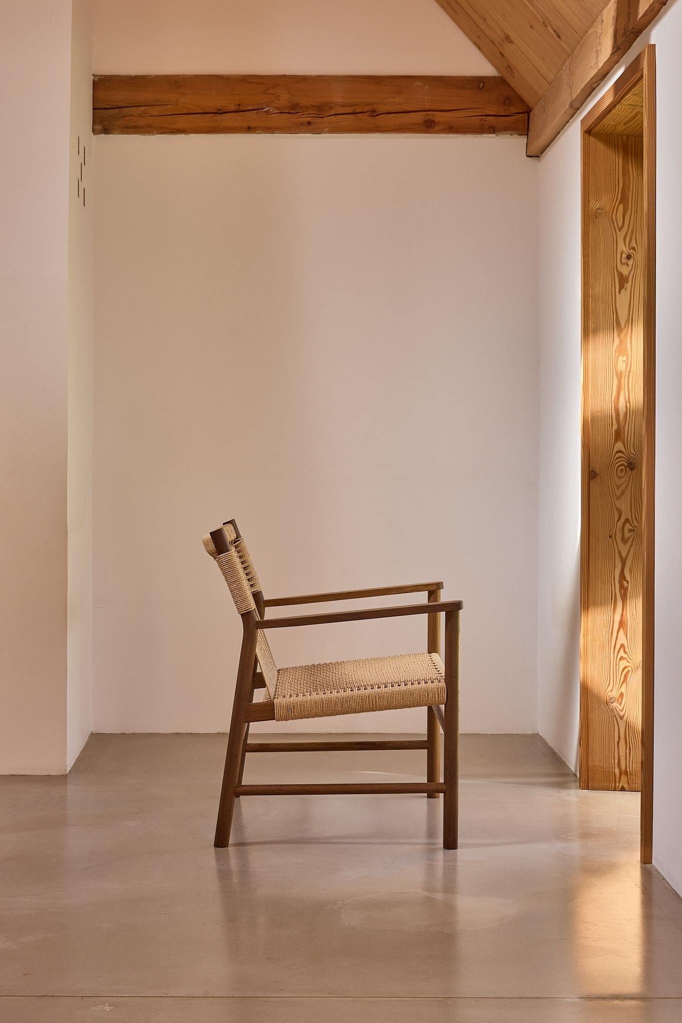 MG107 Lounge Chair by Malte Gormsen
Dimensions: D 64.2 x W 62.2 x H 77.6 cm.
Materials: Smoked oak, natural paper cord.

Available in Nature, Raw Nature, Soap, Smoked, and Dark Nature.

Malte Gormsen Møbelsnedkeri is a cabinetmaker who combines