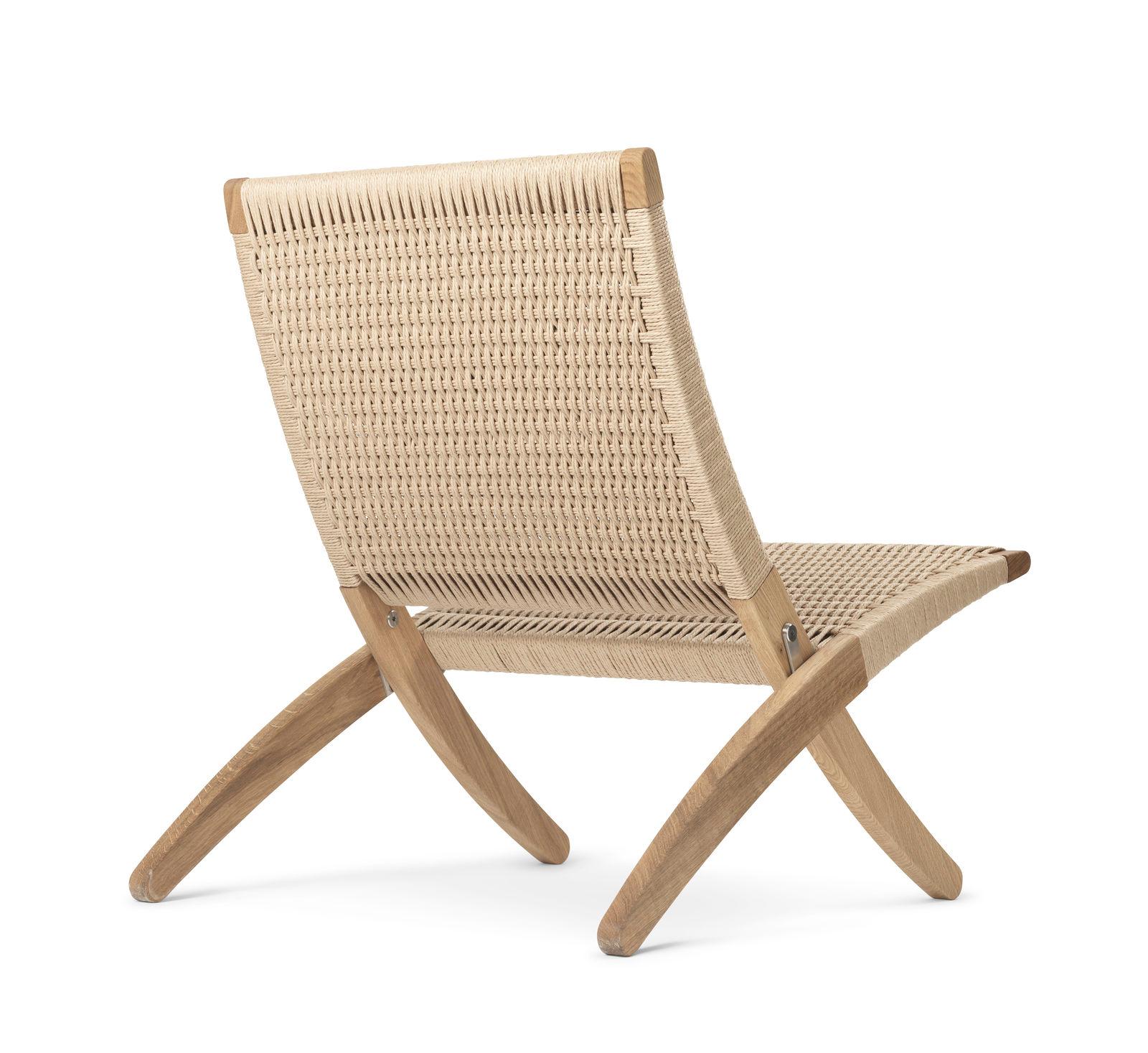 The MG501 Cuba chair by Morten GÃ¸ttler takes extra seating to a new level. It features a solid oak frame, with the cotton girths around the frame forming a comfortable seat and back and providing excellent support as they gently follow the bodyâ€™s