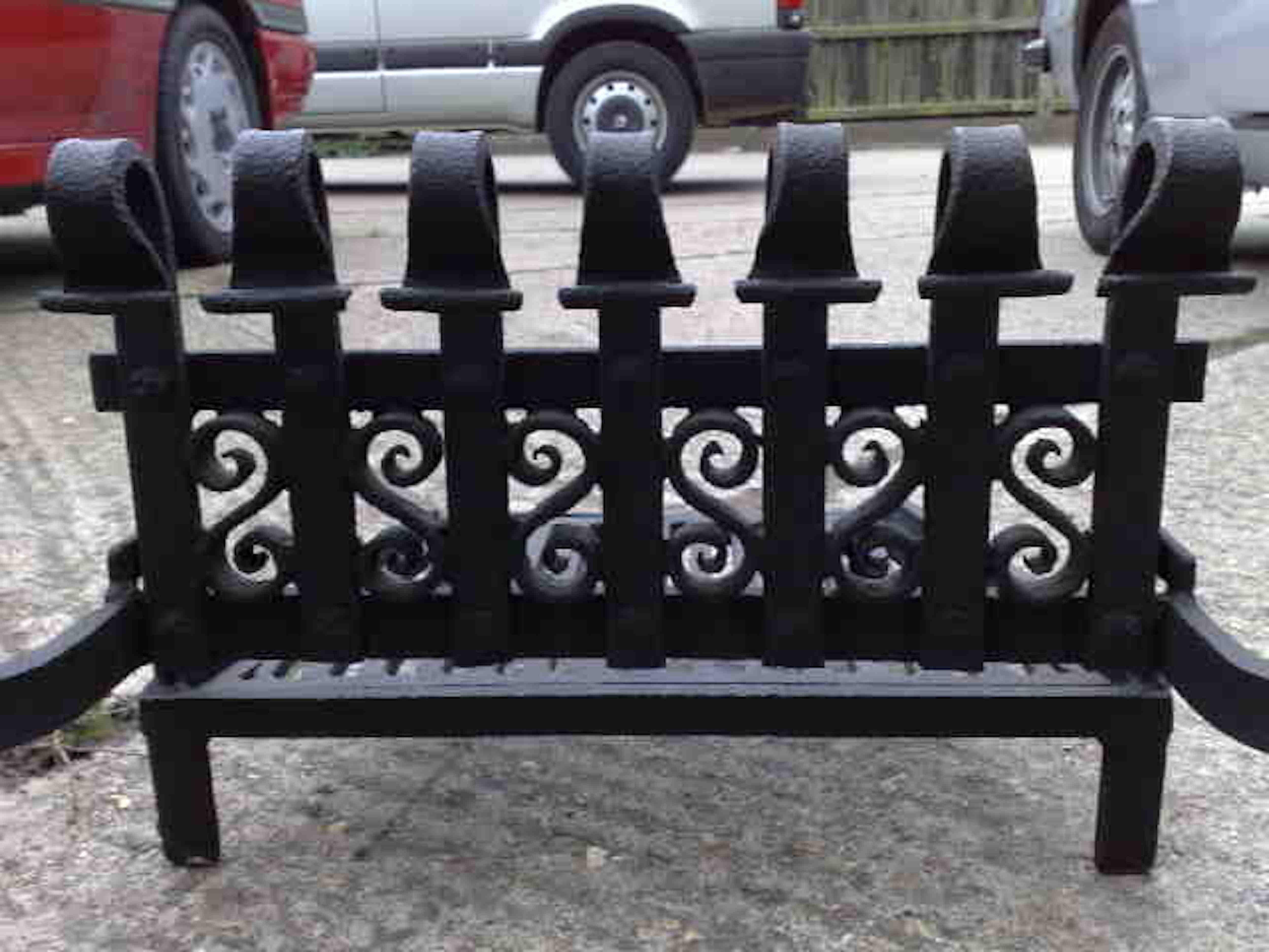 Arts and Crafts M.H. Baillie Scott Attributed, a Hand Forged Iron Grate with Integrated Andirons For Sale