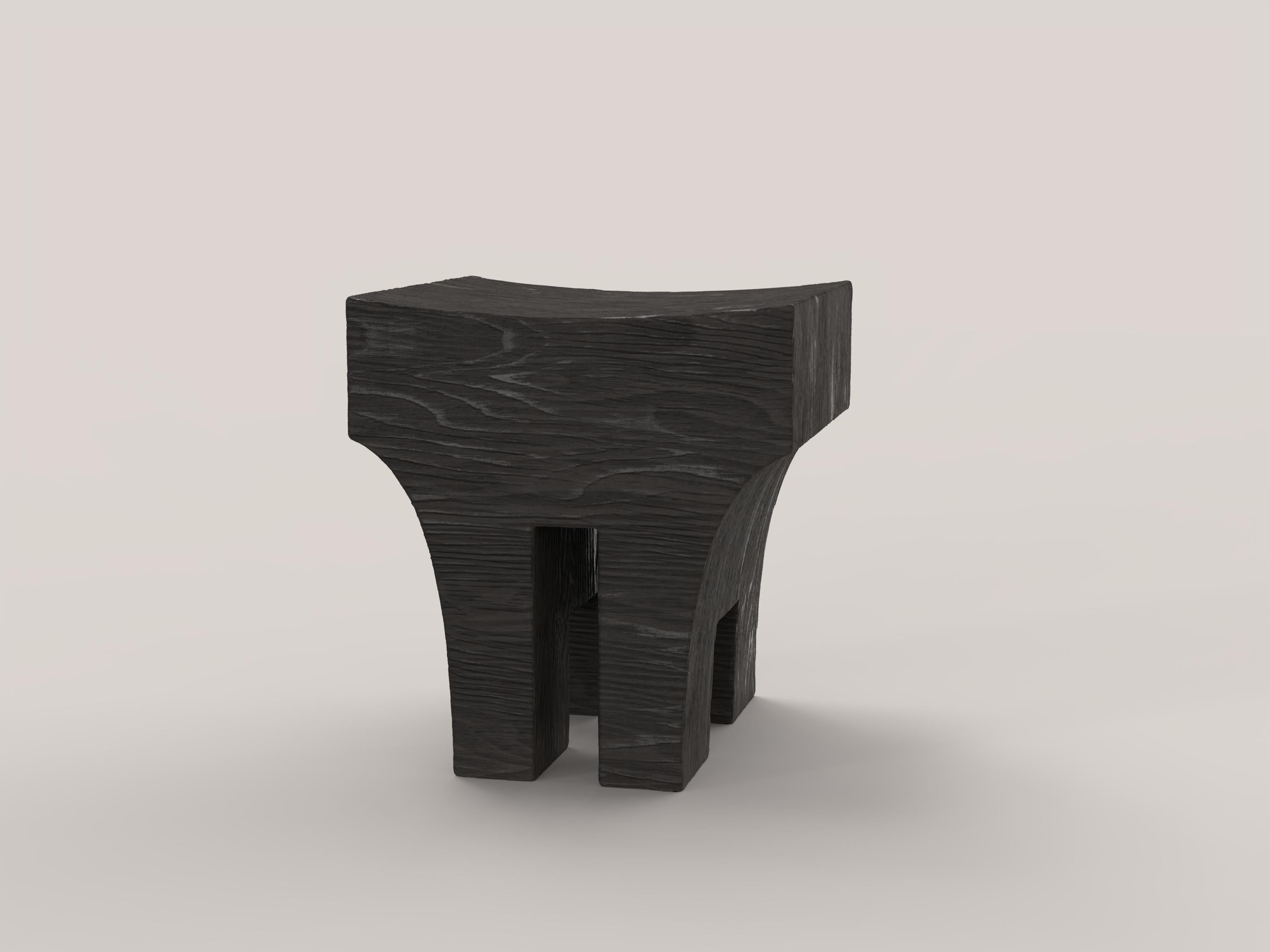 Mhono V1 Stool by Edizione Limitata
Limited edition of 150 pieces. Signed and numbered.
Dimensions: D 40 x W 35 x H 43 cm.
Materials: Charred solid wood.

This contemporary collection is a product of Italian craftmanship, starting entirely from