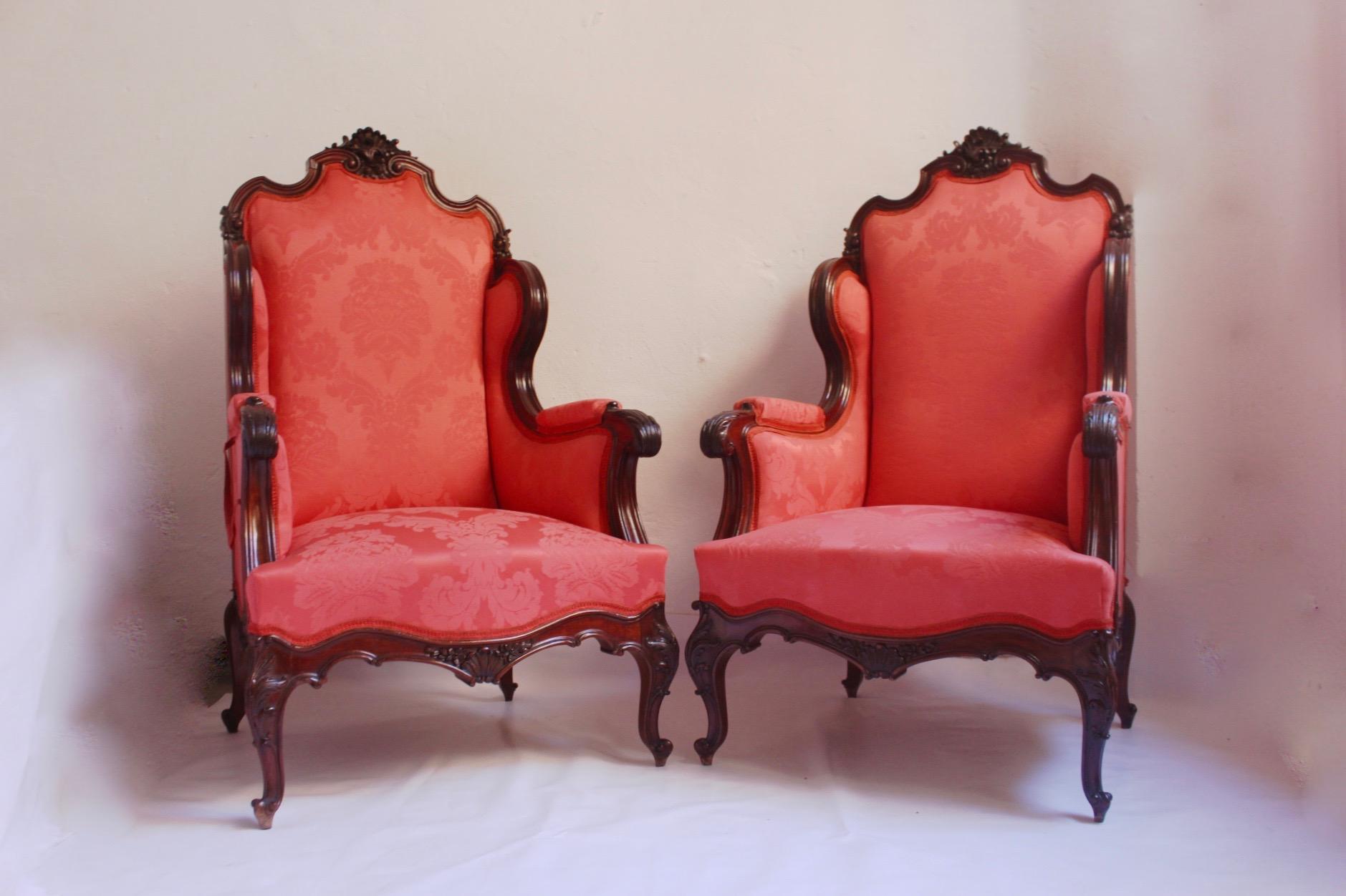 Unique Louis XV style handcrafted lounge set, 2 armchairs and one chair, Spain, circa 1950s.
Stunning set made in Valencia, Spain, by high class cabinet-makers for their own family. The whole set made from solid wood and upholstered in red silk.