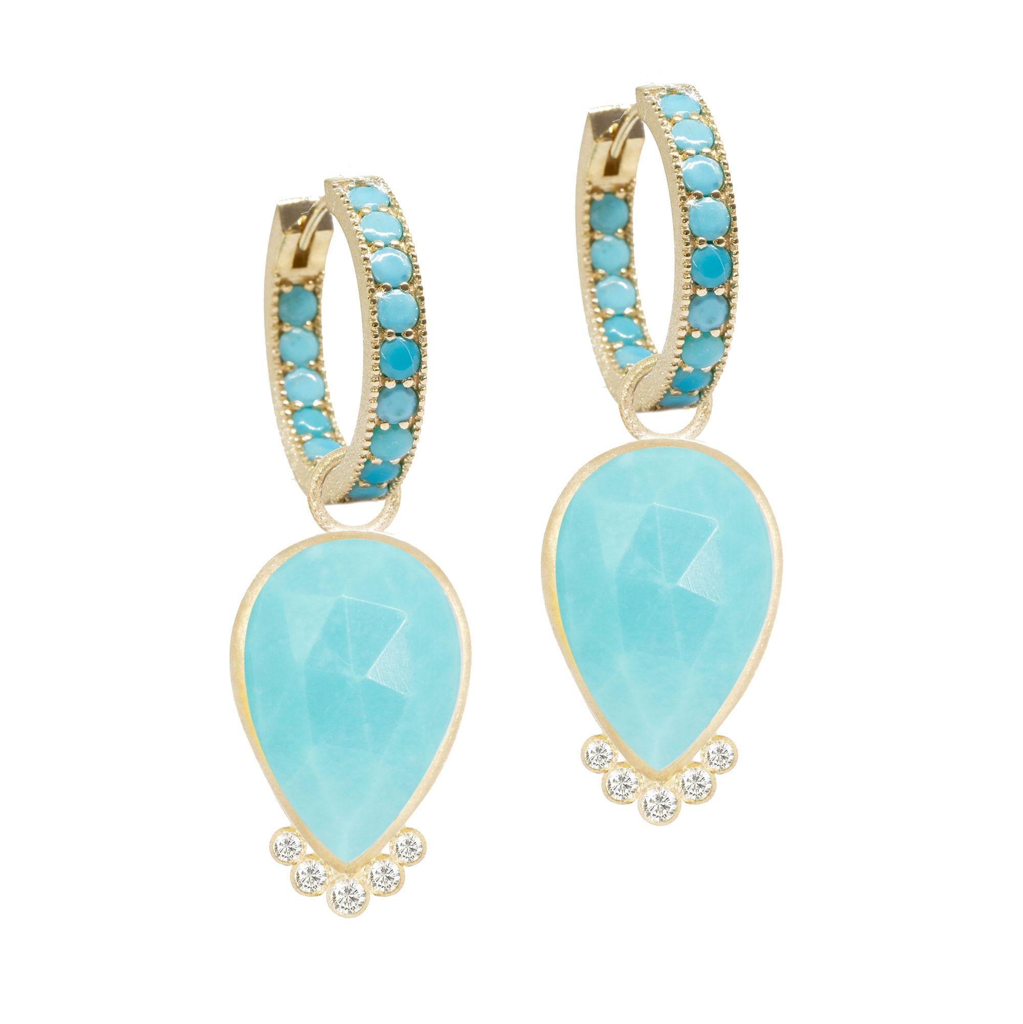 With vibrant turquoise in a petal-like pear shape, the diamond-accented Mia Medium Gold Charms bloom with any of our hoops and mix well with other styles.

Nina Nguyen Design's patent-pending earrings have an element on the back of the stud or charm