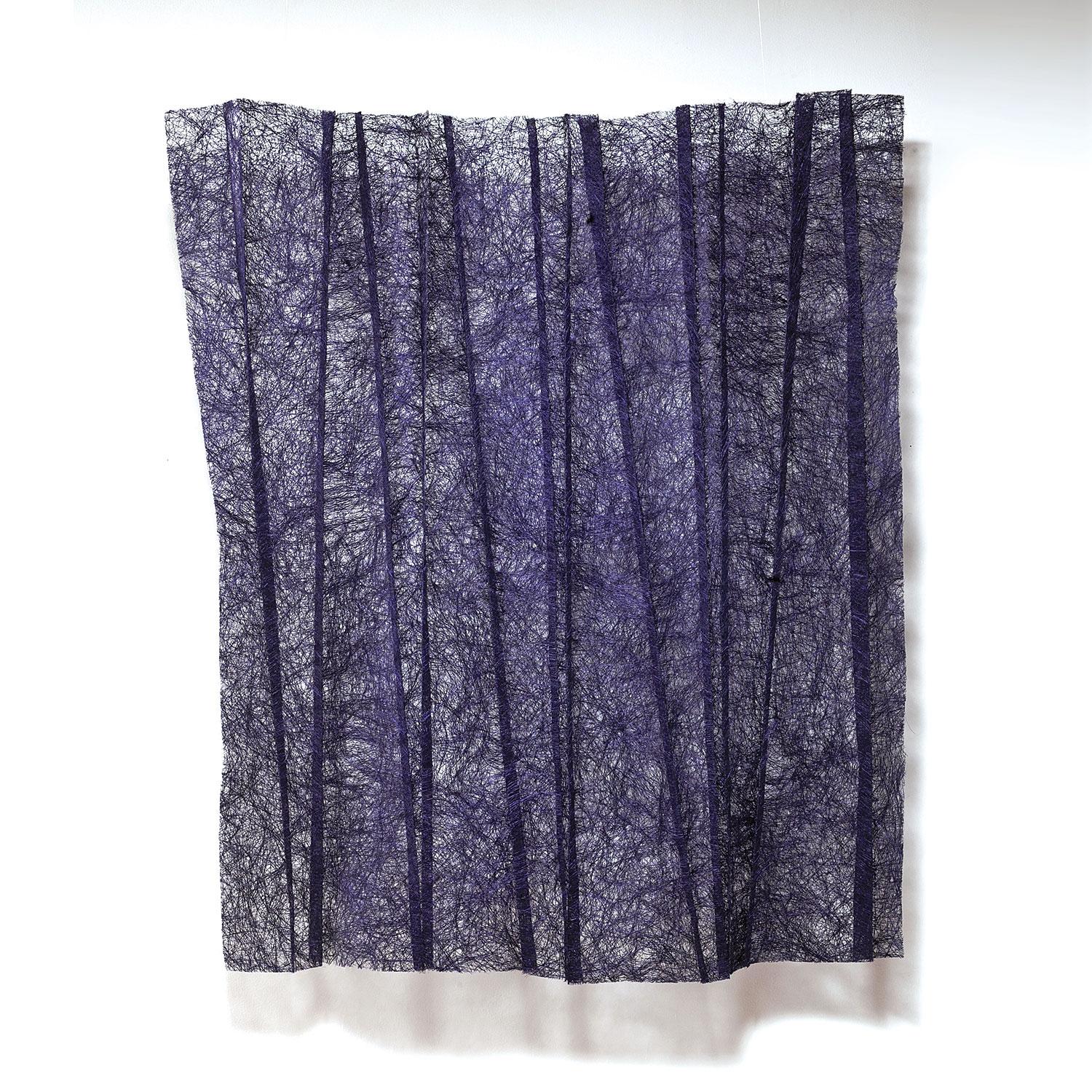 Blue/Purple Pleats is made of sisal fibers, dyed and formed in a technique unique to Mia Olsson. The sisal fibers used by the Swedish artist are shiny and reflect the light, even more when formed in relief. The colors are richly saturated — engaging
