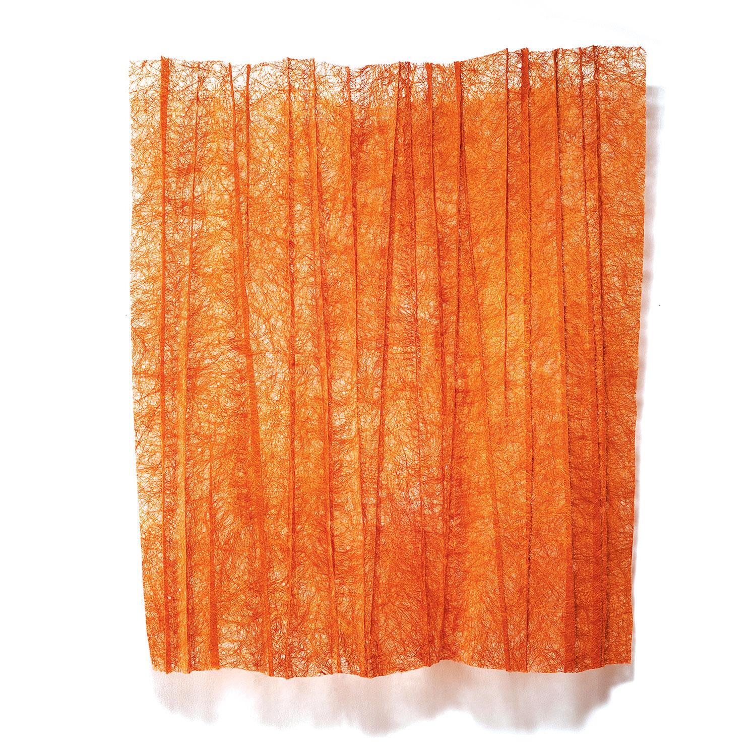 Orange Pleats is made of sisal fibers, dyed and formed in a technique unique to Mia Olsson. The sisal fibers used by the Swedish artist are shiny and reflect the light, even more when formed in relief. The colors are richly saturated — engaging the