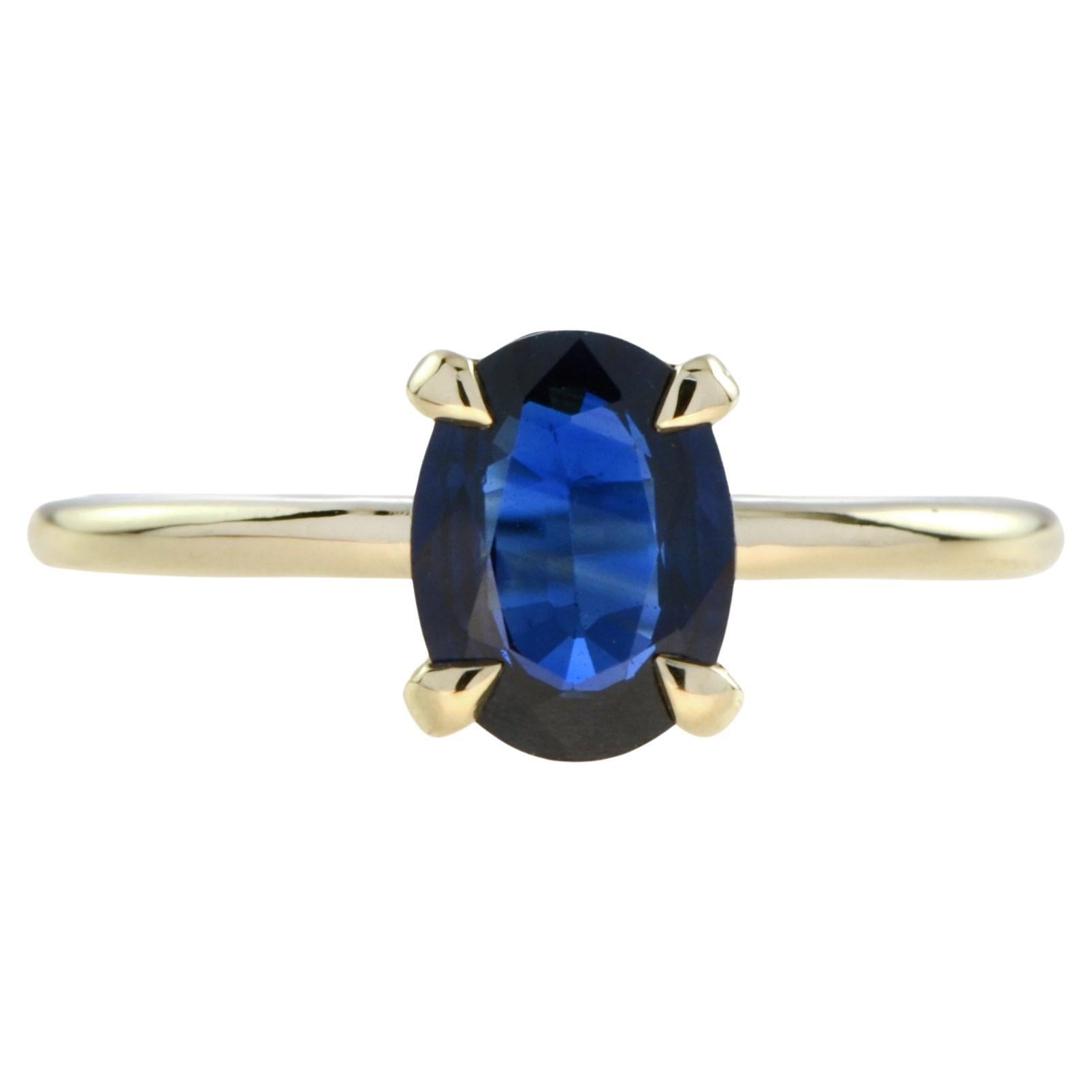 Mia Solitär-Ring aus 9 Karat Gelbgold mit ovalem blauem Saphir