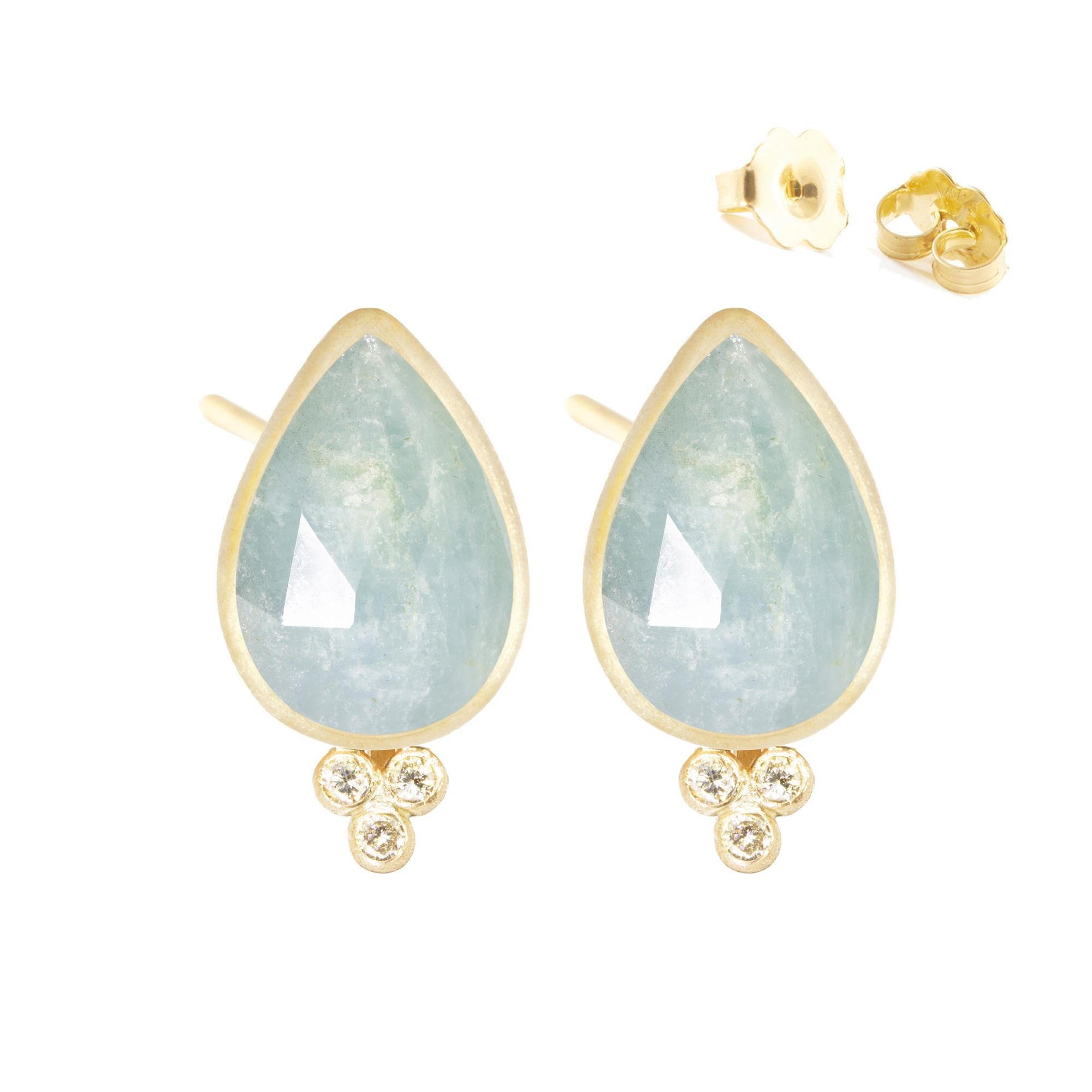 With faceted aquamarine in a petal-like pear shape and sparkling diamonds, the Mia Small Gold Studs bloom to their fullest potential when you wear them with denim, linen, cashmere…basically everything in your closet.

Nina Nguyen Design's