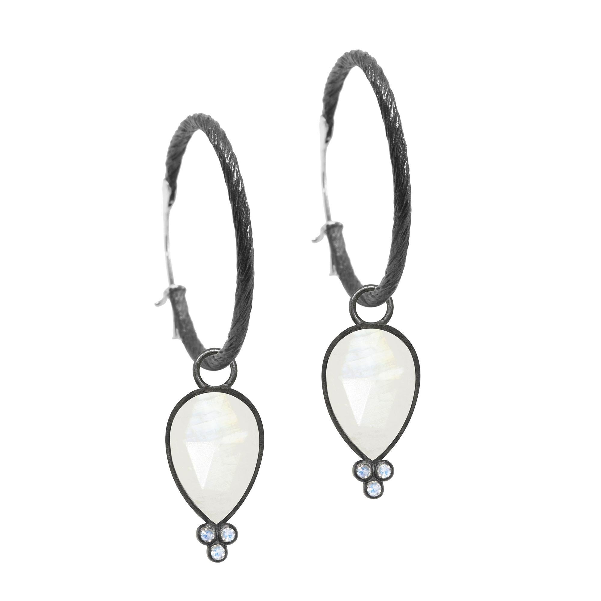 With rich, regal moonstone in a petal-like pear shape, the diamond-accented Mia Small Oxidized Charms bloom with any of our hoops and mix well with other styles.

Metal: Sterling Silver Oxidized
Stone carat: 9
Hoop size: 25mm
Stone size: