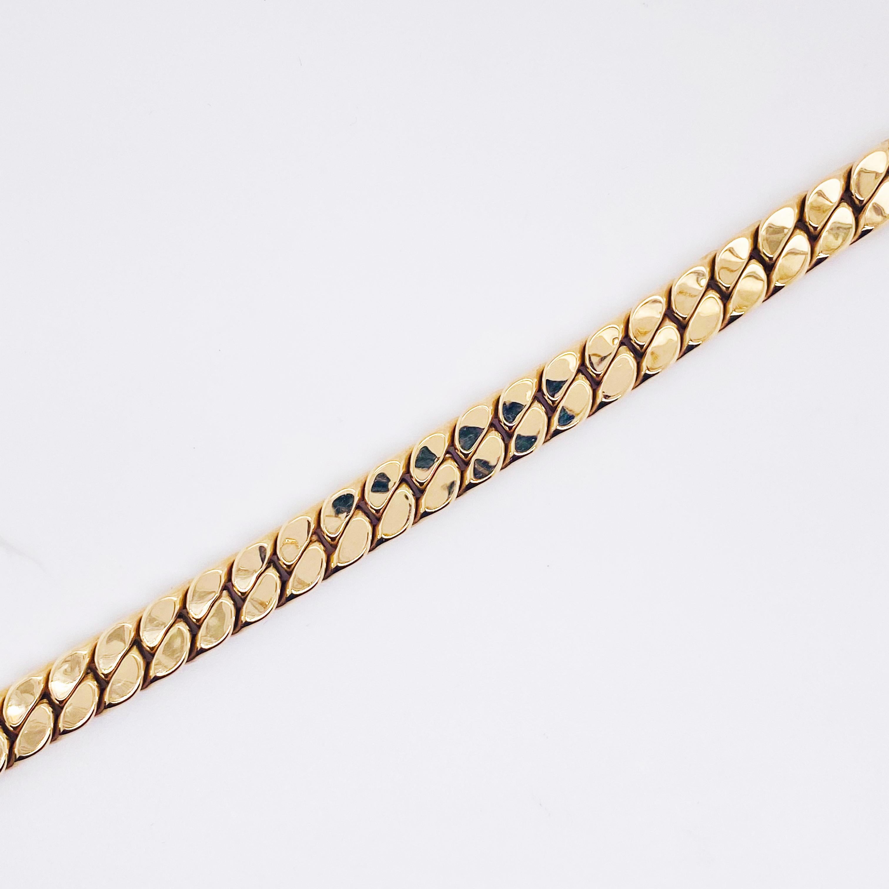This 8 inch gold bracelet looks great on a large woman's wrist or a man's wrist. If is designed and made out of 14 karat yellow gold. This means that it is NOT PLATED and it has a super heavy look since it is 7 millimeters wide. The bracelet is