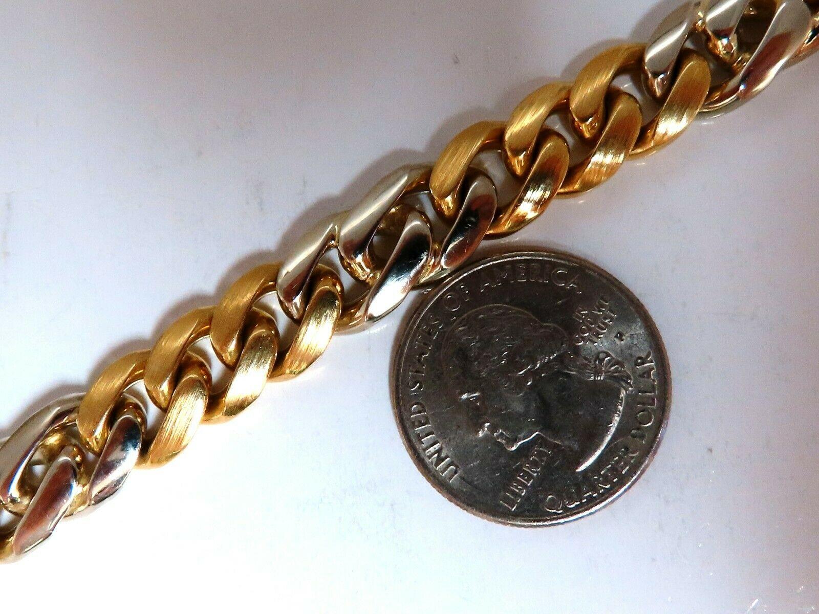 Classic Miami Cuban Link Chain 

Bracelet

Durable, Well Made

14kt. yellow gold

Two Toned

57 Grams.

10.5mm wide

7 inch long

wide caliber clasp.