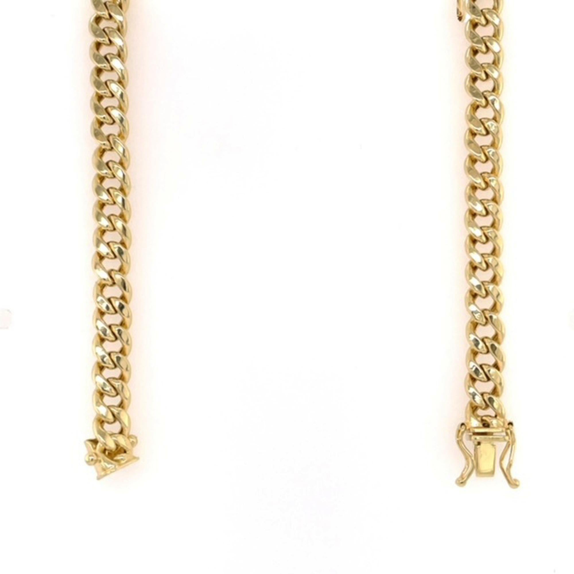 This classic Miami Cuban link chain is handcrafted in highly gleaming 14K yellow gold. The chain is 24 inches in length and 6.1mm in width. Total weight: 22.7 grams. This chain securely locks with a durable box clasp with two safety latches from