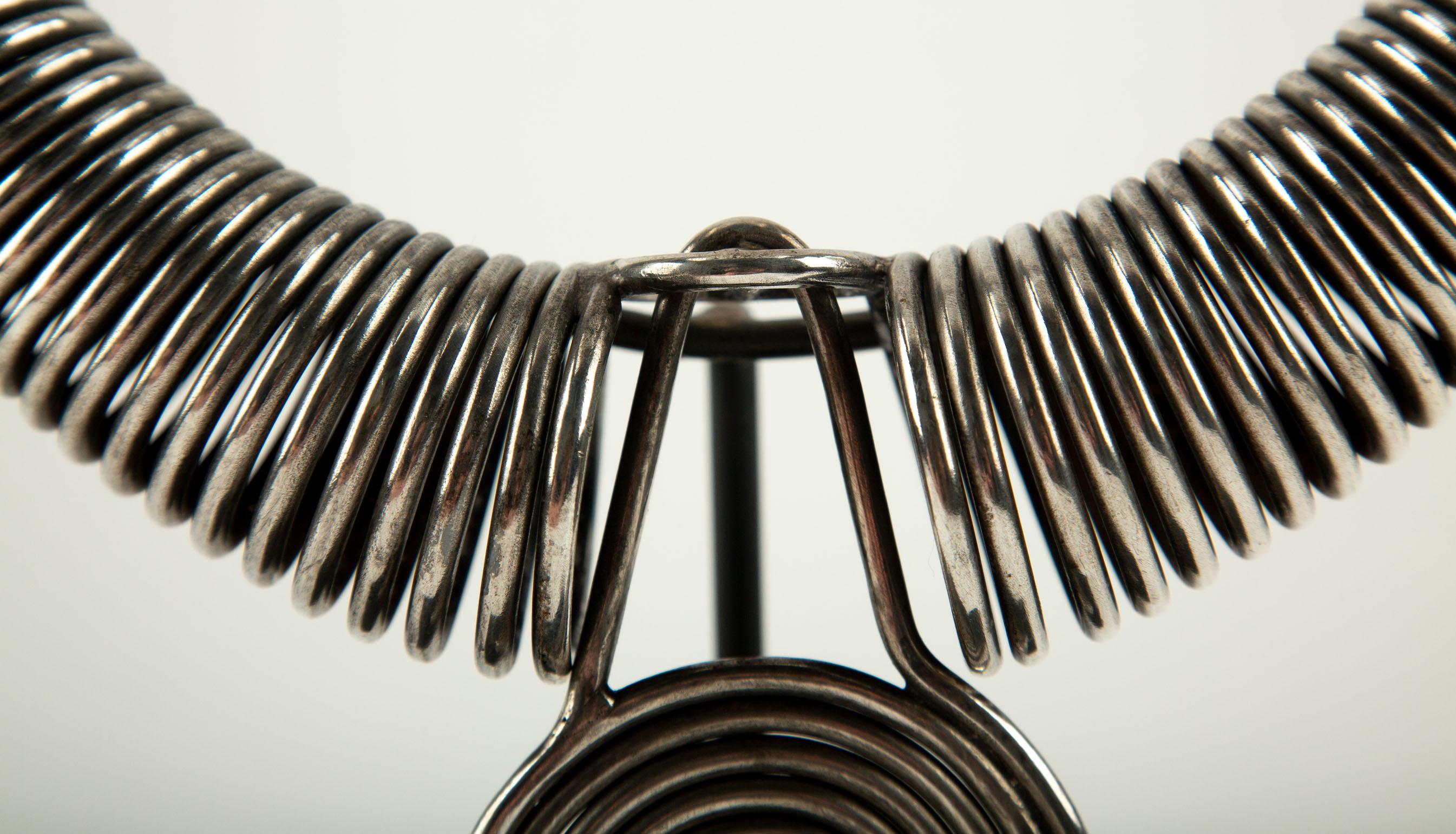Miao Tribe Silver Necklace with Coiled Rings with Center Medallion In Excellent Condition For Sale In New York, NY
