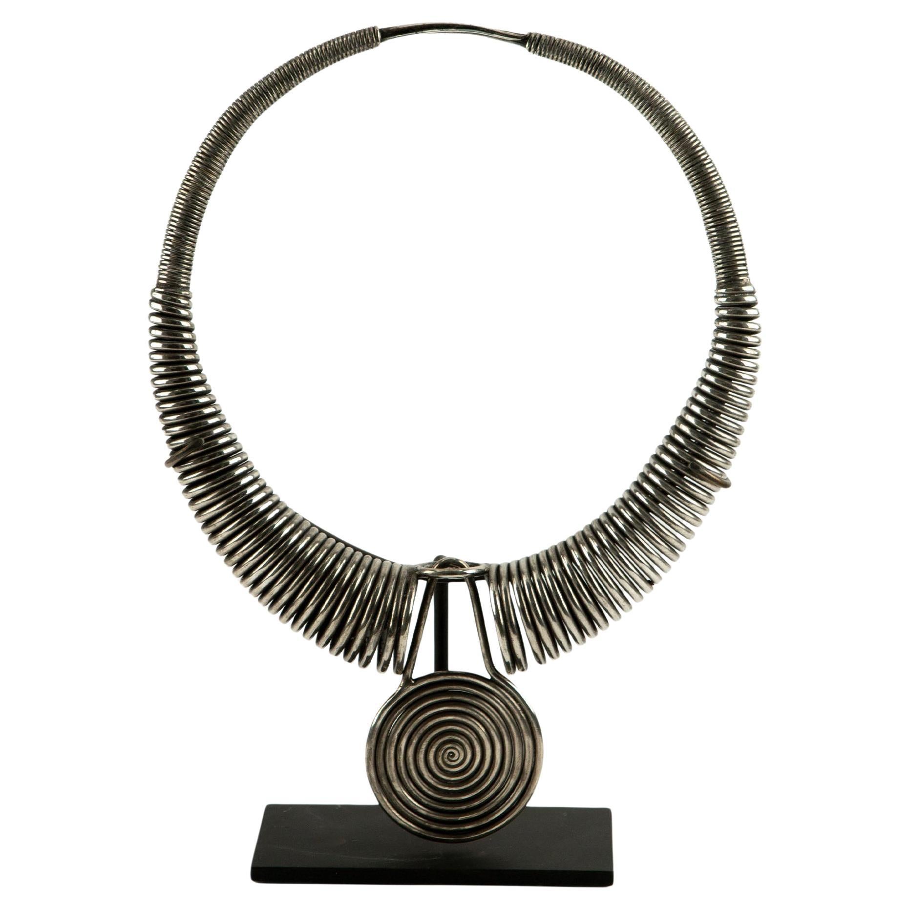 Miao Tribe Silver Necklace with Coiled Rings with Center Medallion For Sale
