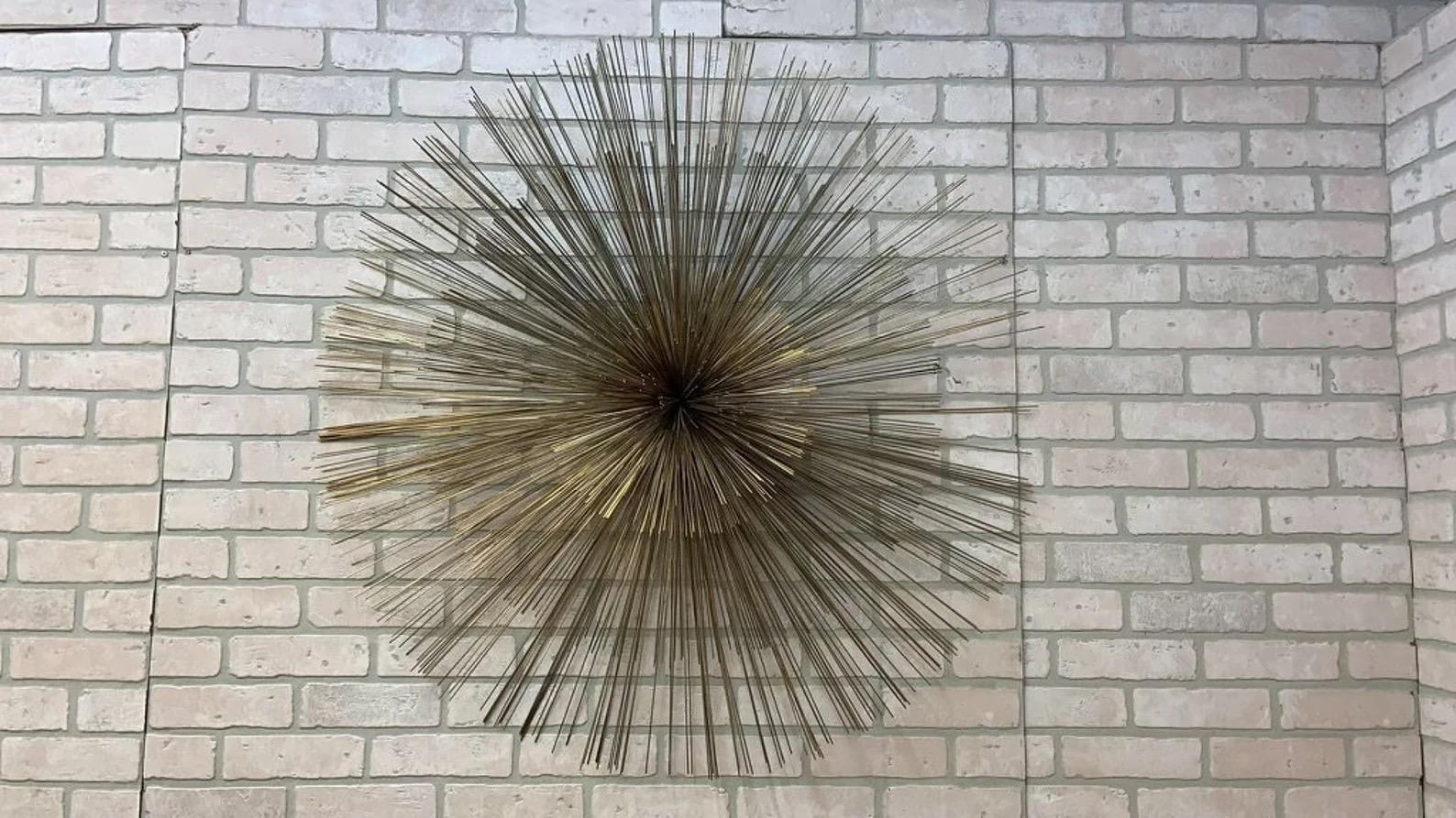 Mid Century Modern Curtis Jeré Nickel Sea Urchin/Pom-Pom Wall Sculpture

Introducing the funky Mid Century Modern Curtis Jeré Nickel Sea Urchin/Pom-Pom Wall Sculpture, a captivating piece of Brutalist art that will elevate the aesthetic of any