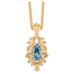 Pendentif poire en or jaune 18K avec zircon bleu Micah Antoni