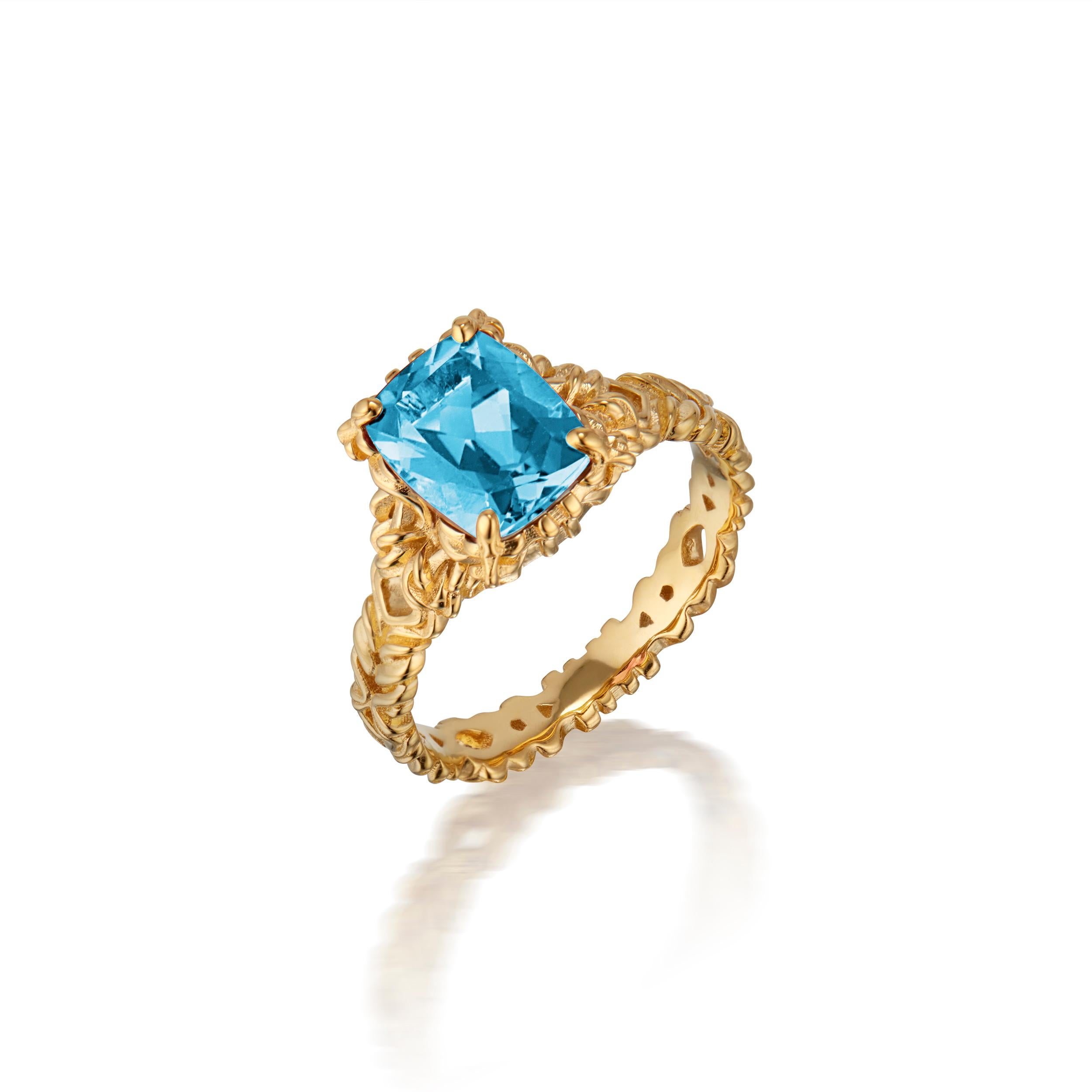 Micah Antoni’s 18K yellow gold, blue zircon ring is a woven three dimensional masterpiece. Superb craftsmanship and intricate dimensional detail ensure allure from every angle making this ring an heirloom statement of modern devotion.

11mm (.4