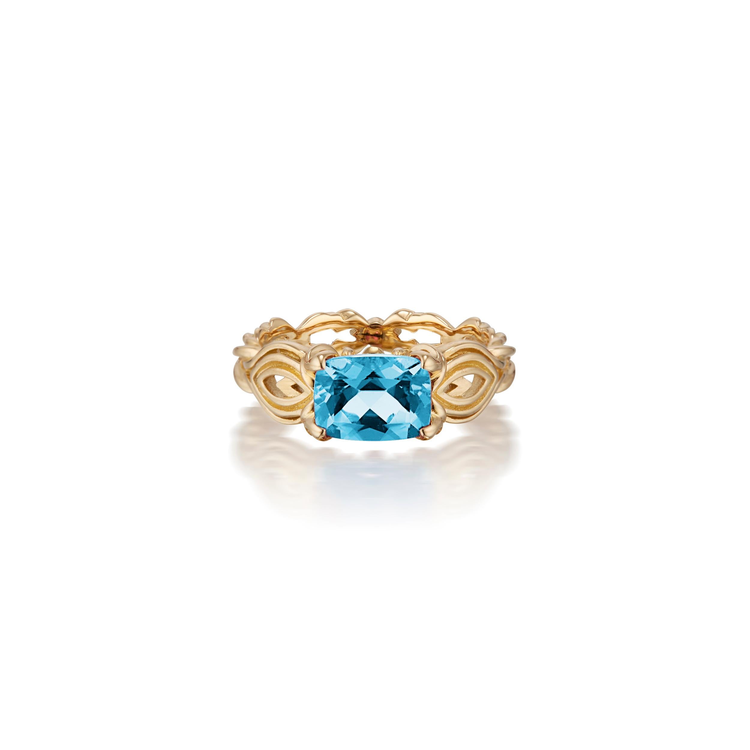 Micah Antoni’s 18K yellow gold, blue zircon ring is a three dimensional masterpiece. Superb craftsmanship and intricate dimensional detail ensure allure from every angle making this ring an heirloom statement of modern devotion.

8mm (.3 inches)