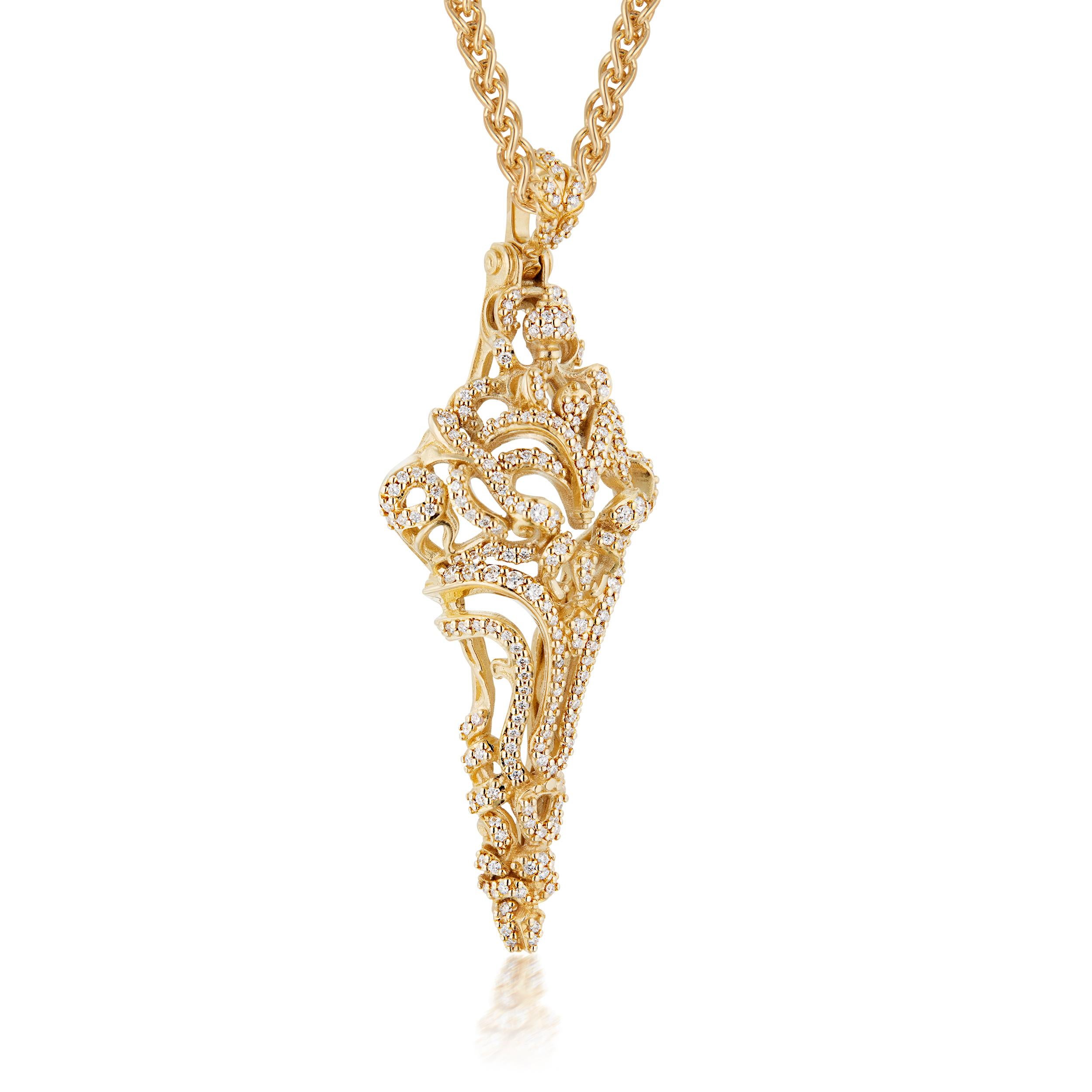 Micah Antoni’s 18K yellow gold pave diamond cross pendant is a three dimensional masterpiece that fascinates from every angle with 1.5 carats of VS2, F diamonds.

Meticulously crafted in rich 18K yellow gold, the Intricata pendant captivates with