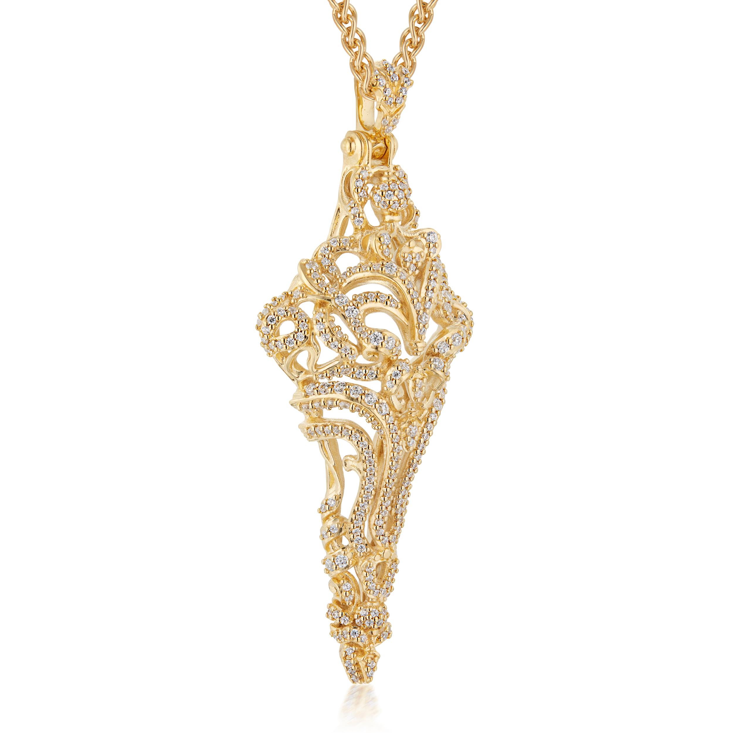 Micah Antoni’s 18K yellow gold pave diamond cross pendant is a three dimensional masterpiece that fascinates from every angle with over two carats of VS2, F diamonds and an enhancer bail (claspable).

Meticulously crafted in rich 18K yellow gold,