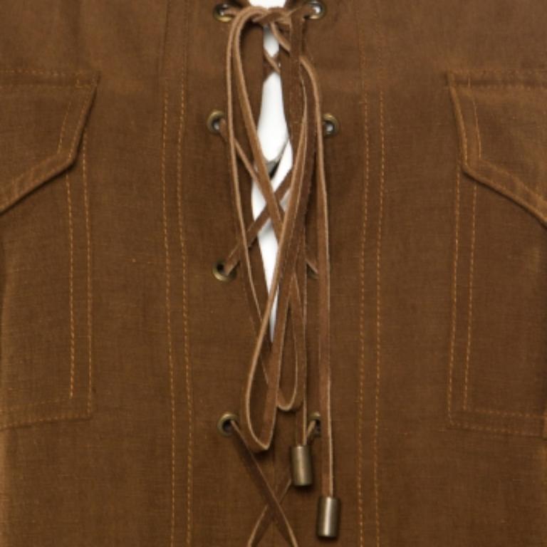 Stay up-to-date with the latest trends by wearing this Michael Kors Safari dress with suitable accessories. Quintessential for all seasons, this brown piece will be your main, no matter what the occasion is. An ideal balance of comfort and style,