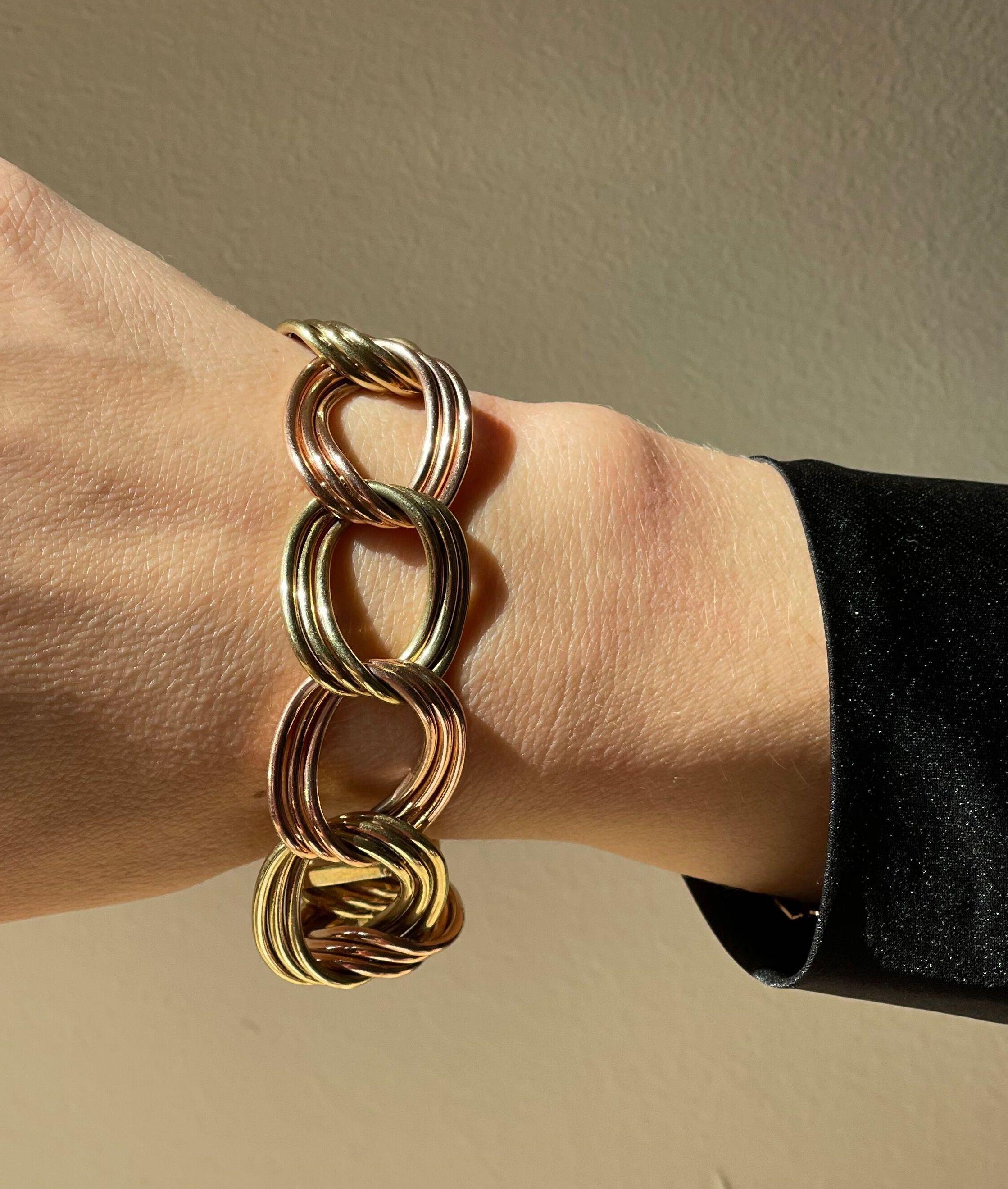 Midcentury 14k gold bracelet, featuring alternating rose and yellow gold links, each section has 3 links. Bracelet is 8