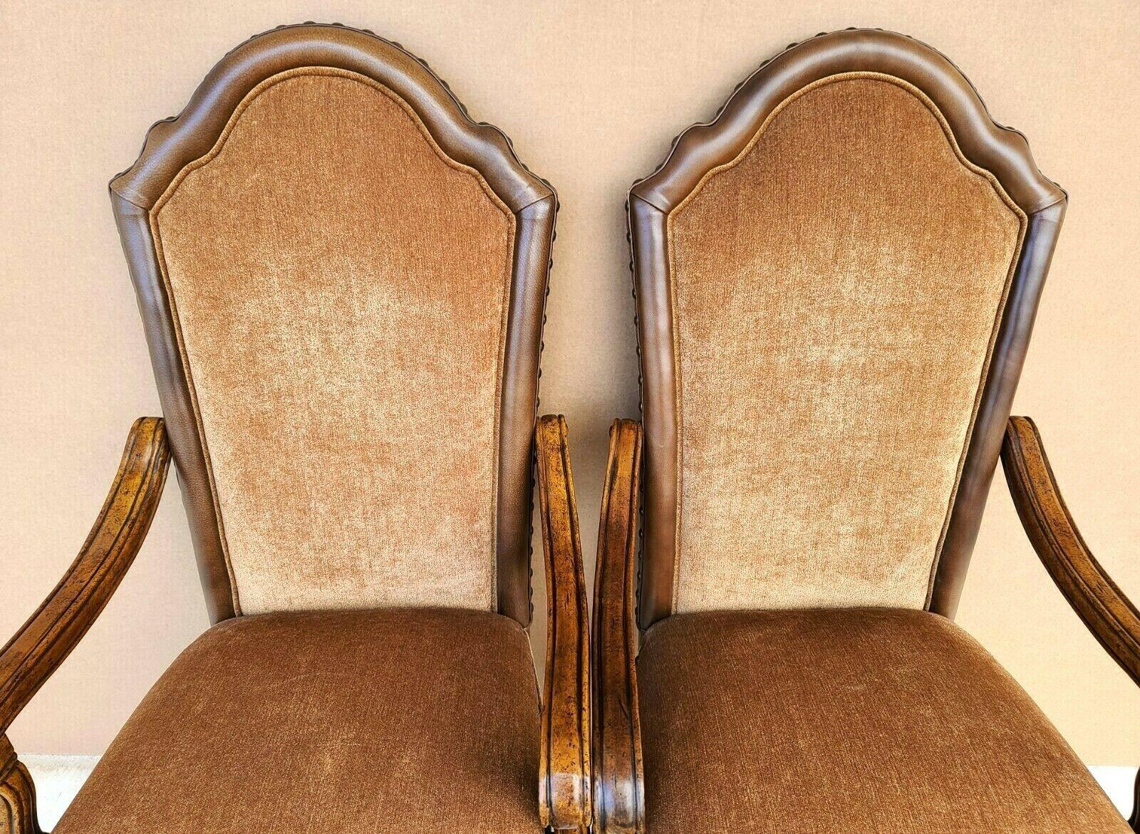 Offering One Of Our Recent Palm Beach Estate Fine Furniture Acquisitions Of A
(2) MICHAEL AMINI Sedgewicke Dining Armchairs
With leather trim and French nail border accents

Approximate Measurements in Inches
44,5