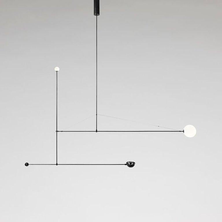 Mobile chandelier 1
Manufactured by Michael Anastassiades
London, 2008
Black patinated brass, mouth blown opaline spheres

Measurements
258 cm x 113 H + pendant rod length to order
101.57 in x 44.48 H + pendant rod length to