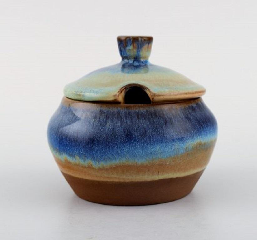Michael Andersen, Denmark. Two bowls, candlestick and lidded jar in glazed ceramics, 1950s
The candlestick measures: 11 x 9.5 cm.
The bowl measures: 12 x 6.5 cm.
In very good condition.
Stamped.
