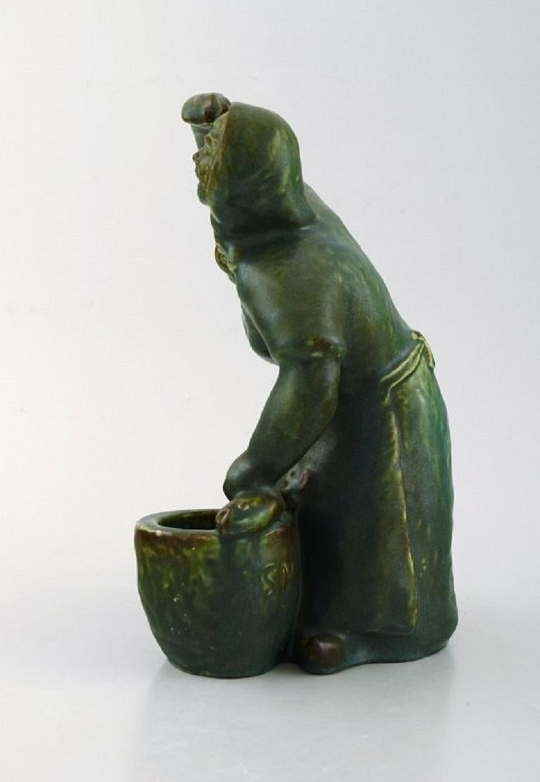 Michael Andersen pottery from Bornholm.
Large figure of fisherman's wife.
Measures: 23.5 x 16 cm.
Perfect condition.